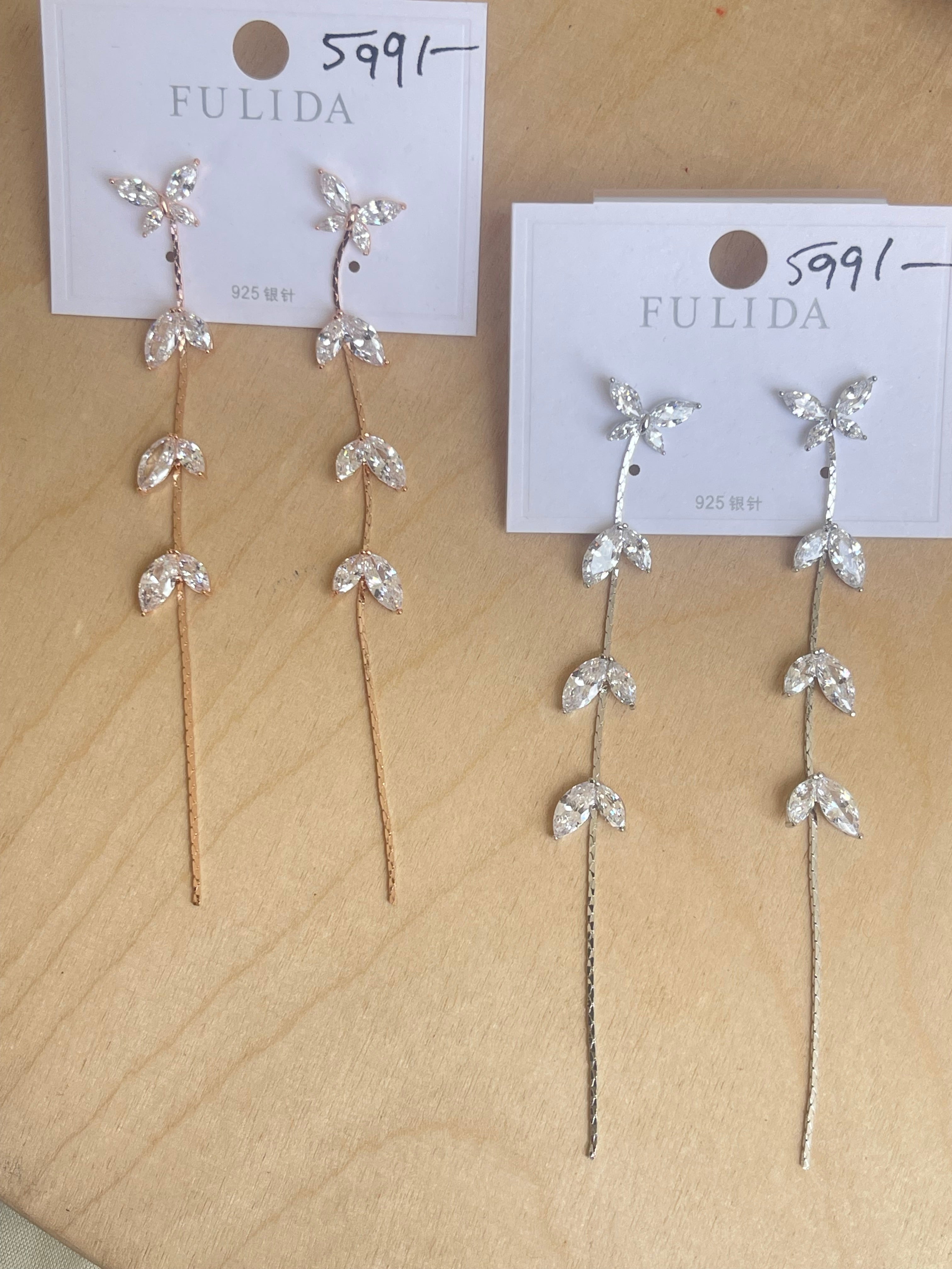 Butterfly tassels in silver and rosegold