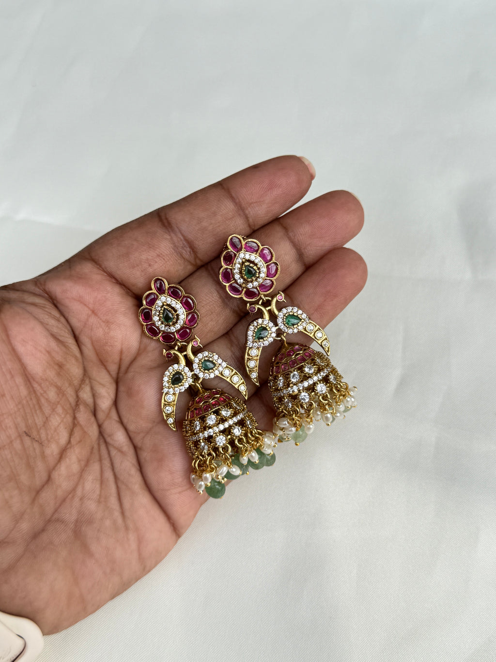 Er149 kemp peacock butta earrings
