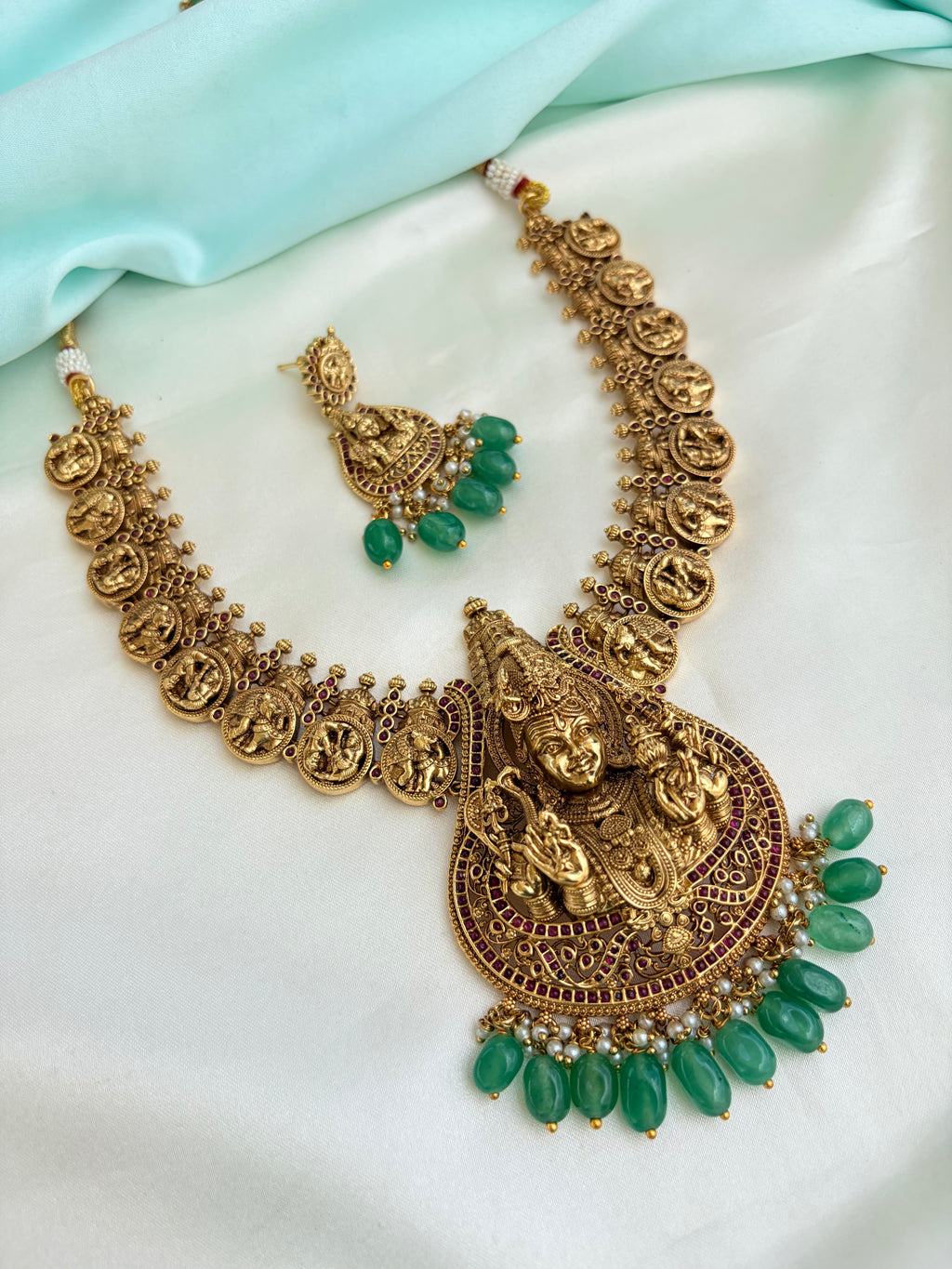 Lord Shiva antique Gold Finish Coin Neckset with Goddess Pendant & Green Beads with Green beads Earrings Ns225by