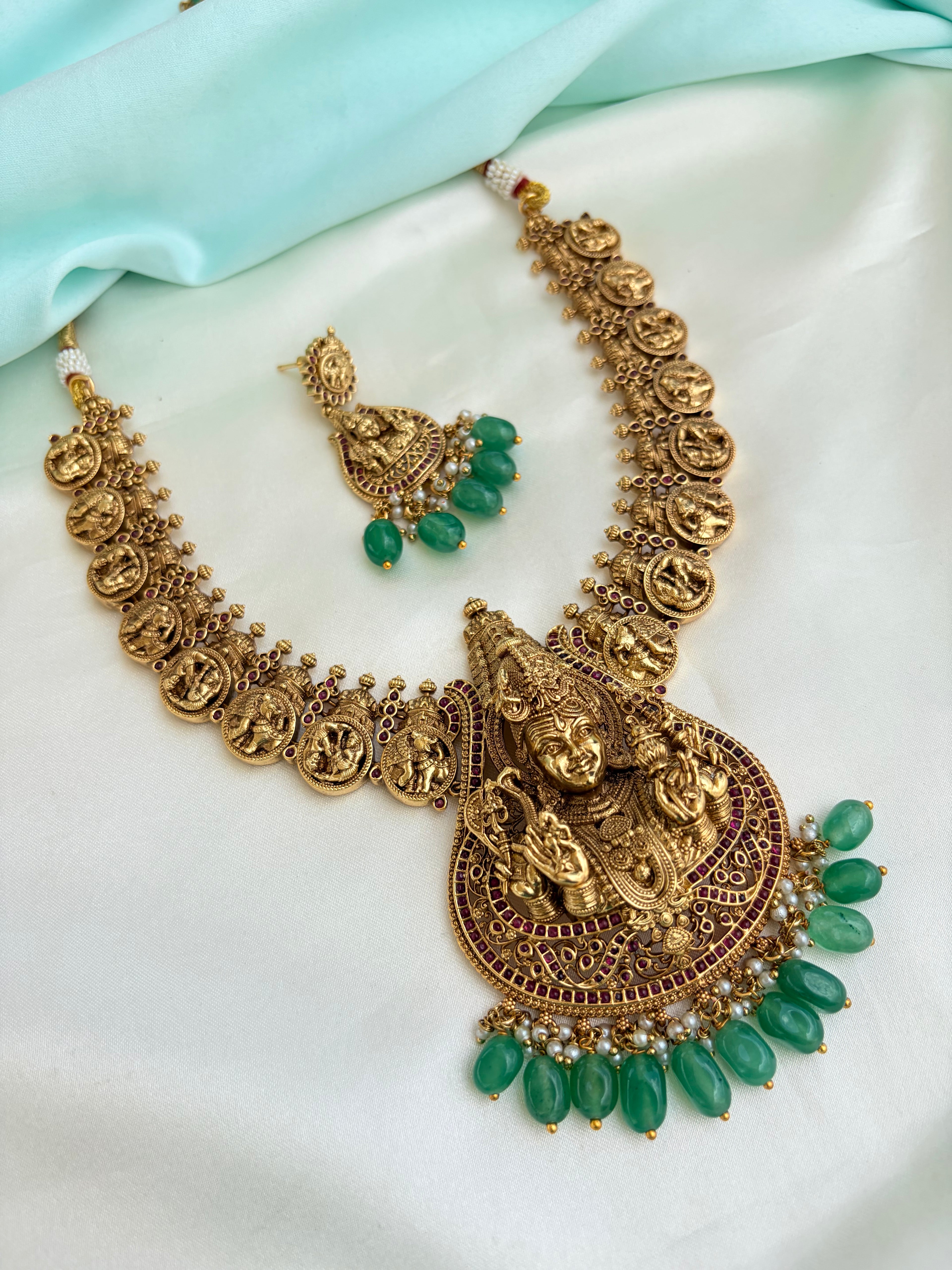 Lord Shiva antique Gold Finish Coin Neckset with Goddess Pendant & Green Beads with Green beads Earrings Ns225by