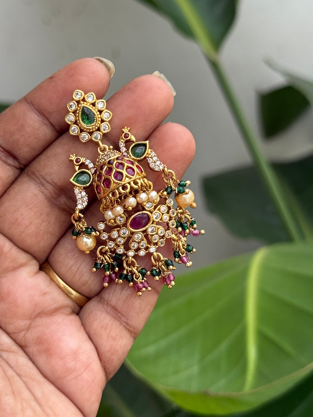 Er76 dual peacock kemp earrings