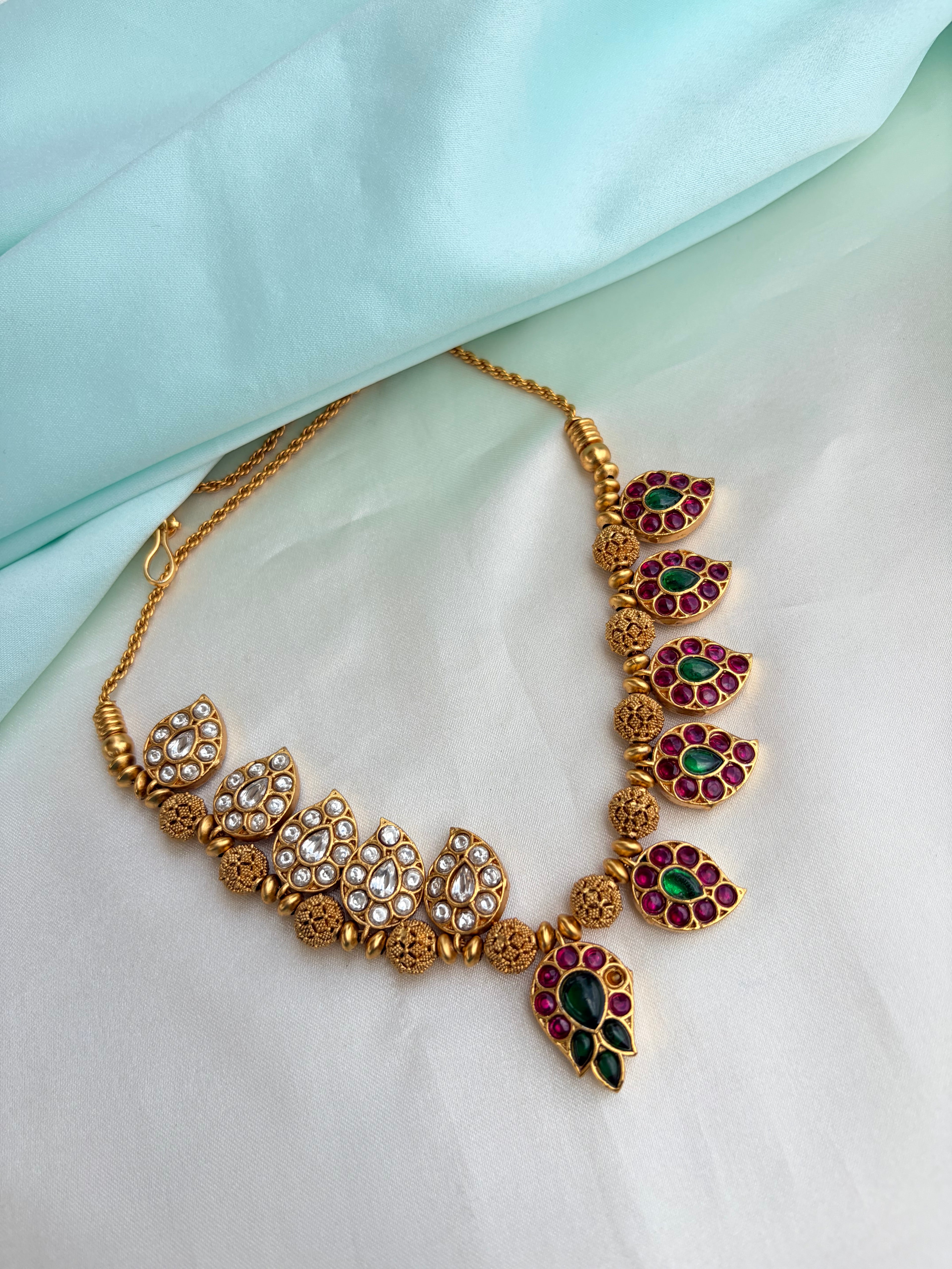 2-in-1 Dual-Sided antique gold Mango motif neckset with Ruby, Emerald, and kundan Stones Ns946