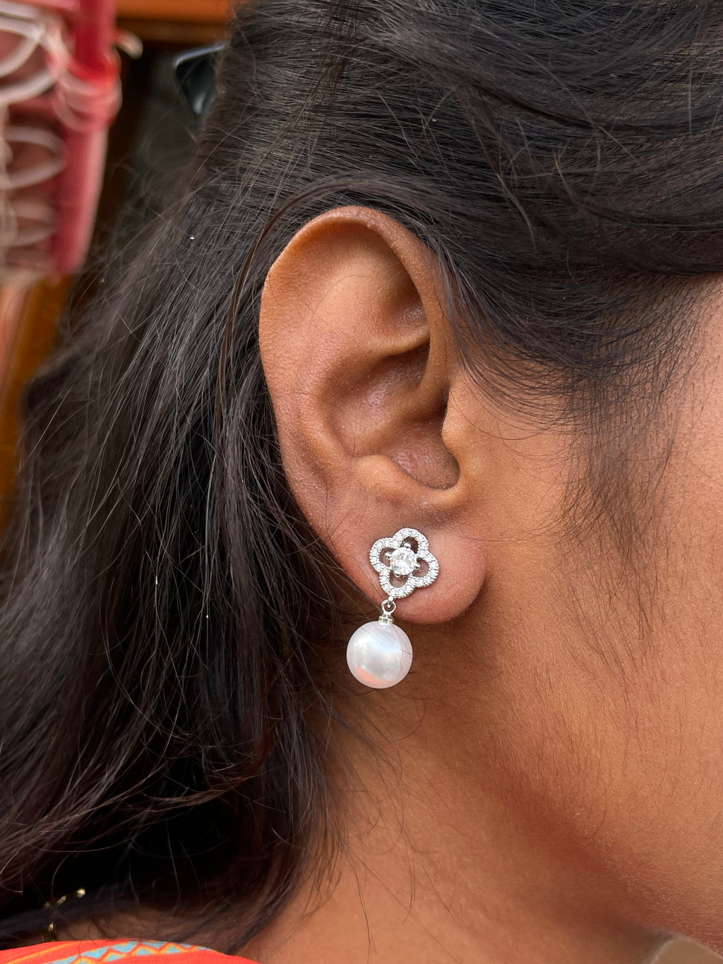 Silver pearl hanging studs