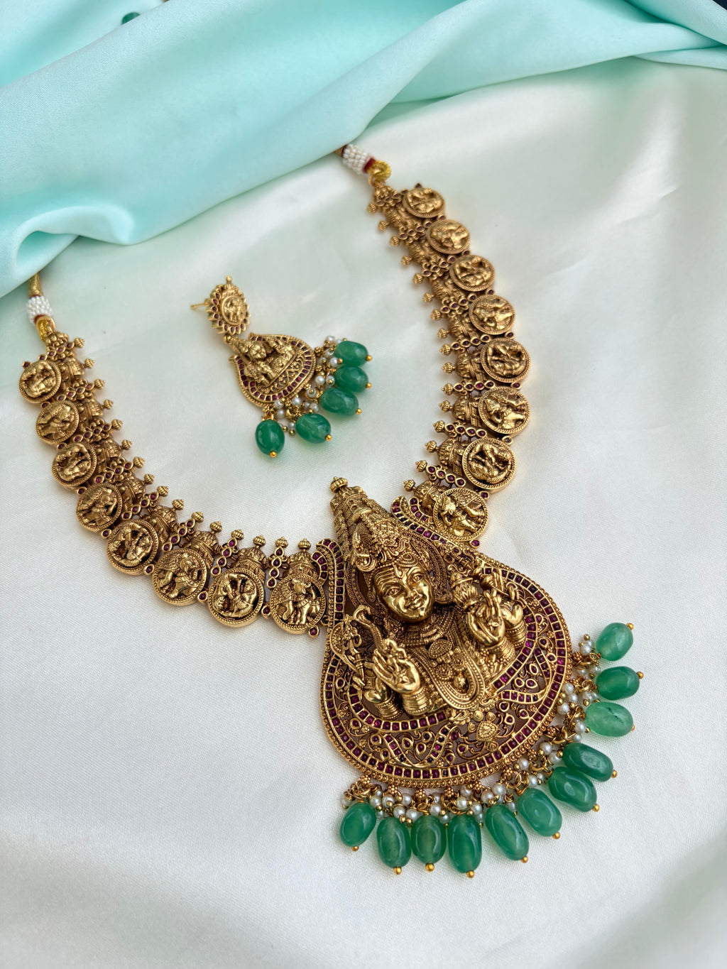 Lord Shiva antique Gold Finish Coin Neckset with Goddess Pendant & Green Beads with Green beads Earrings Ns225by