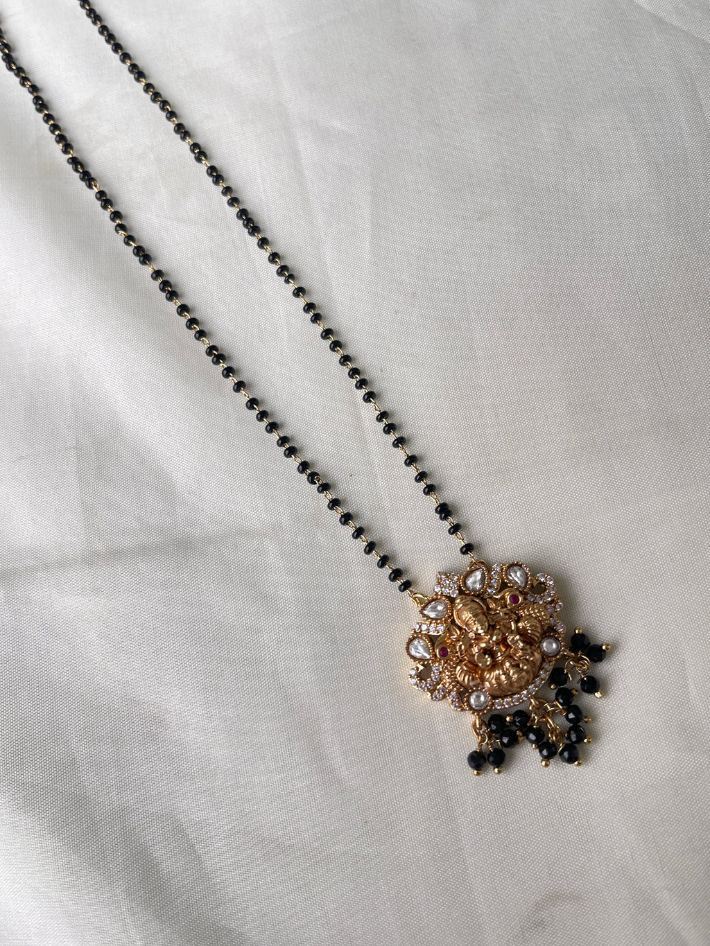 Lakshmi Devi moissanite single line blackbeads