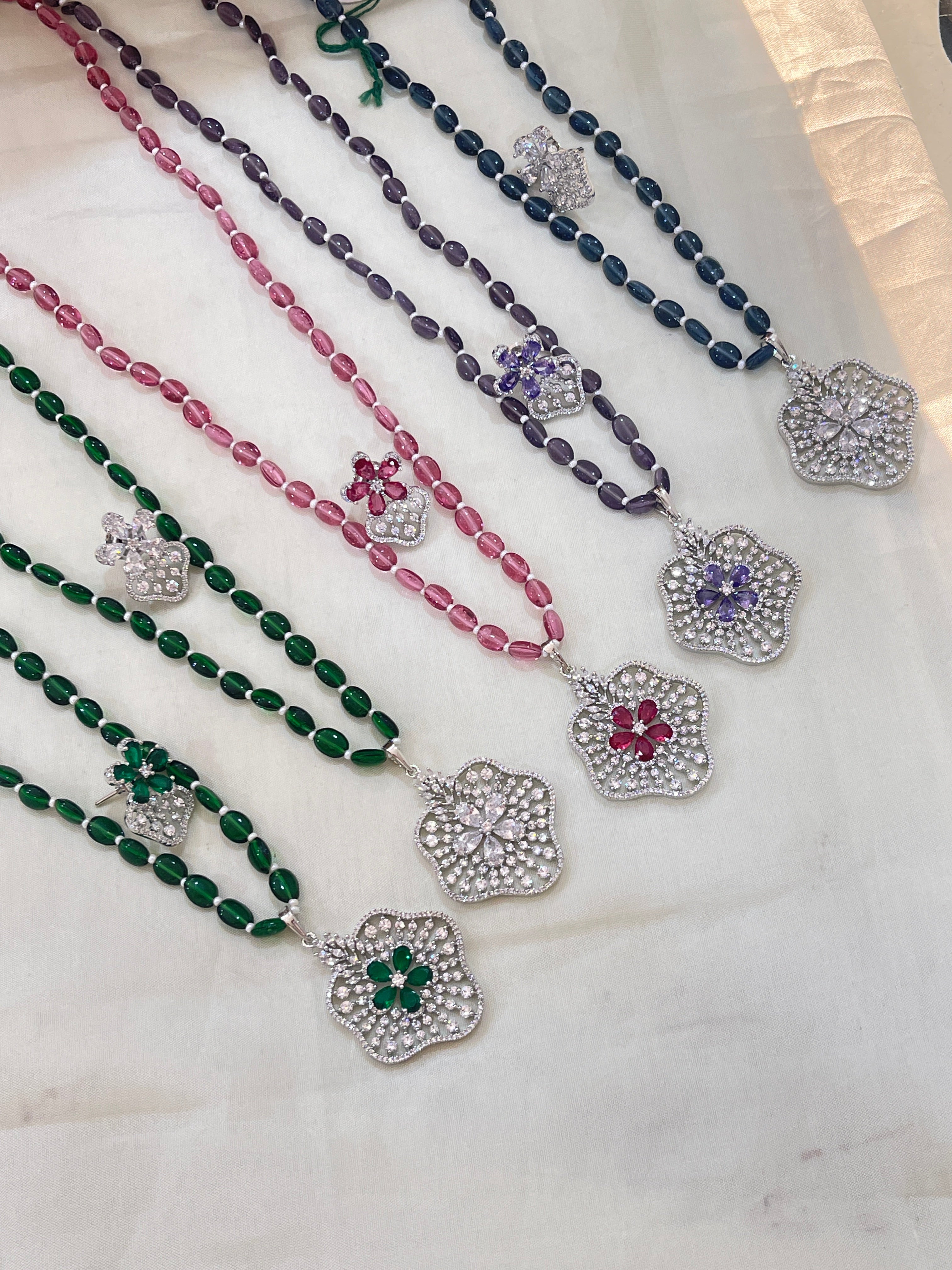 Beads with diamond finish pendent