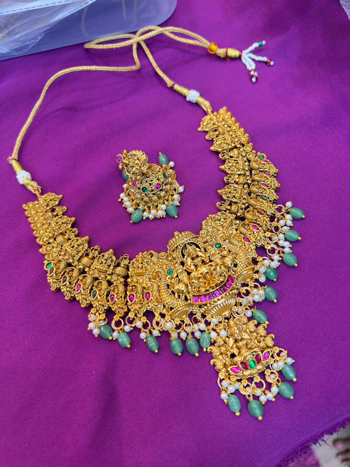 Ns4000 Lakshmidevi pendants with green beads short Neckset with butta earrings