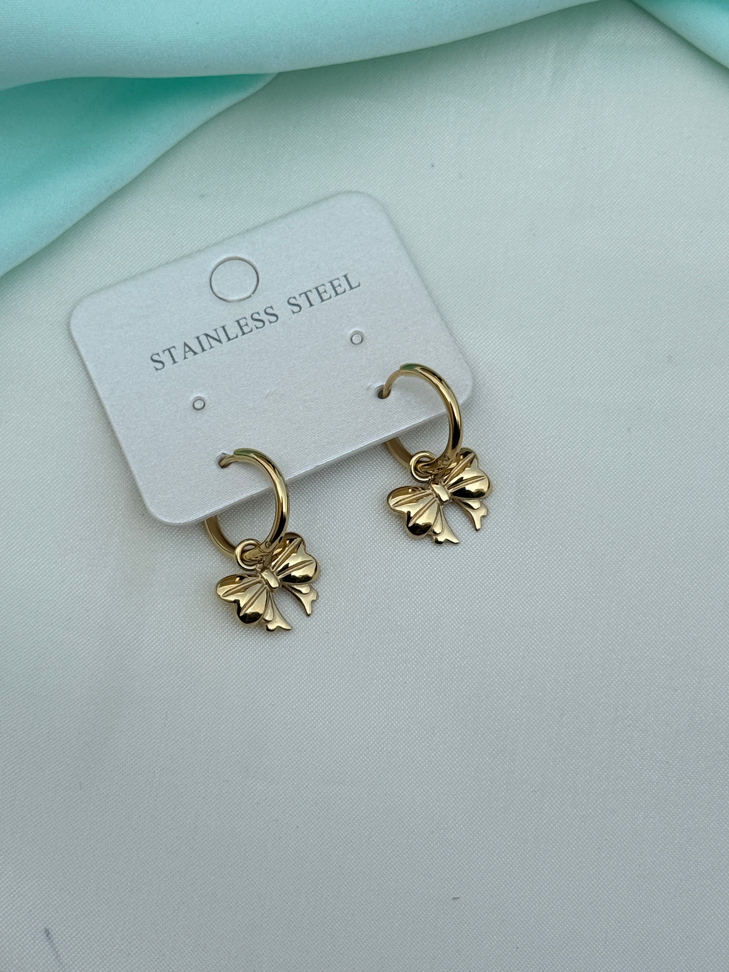 Er270 anti tarnish locksystem bow earrings