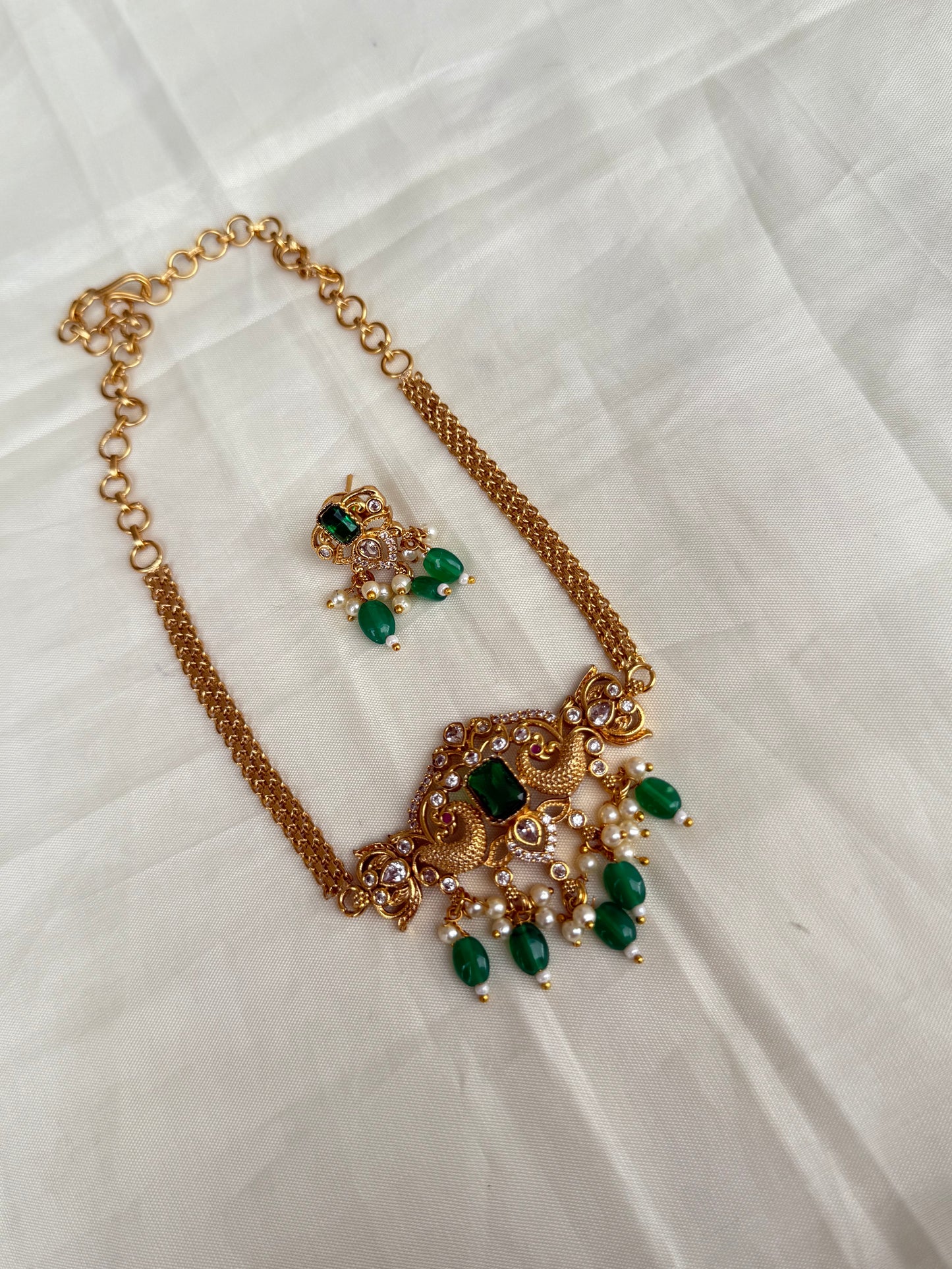 Dual peacock green beads choker with Earrings