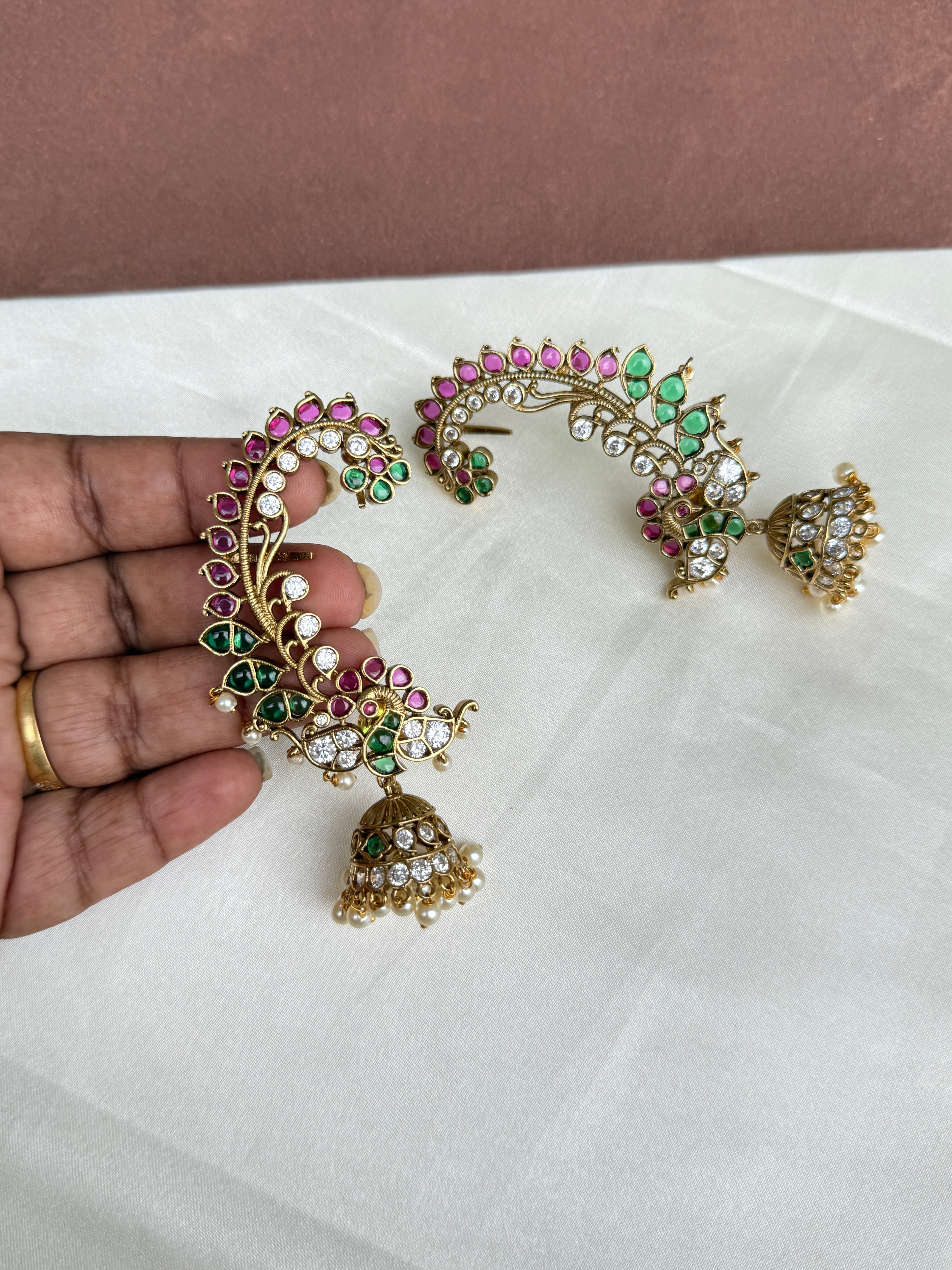 Er103 kemp peacock earcuffs