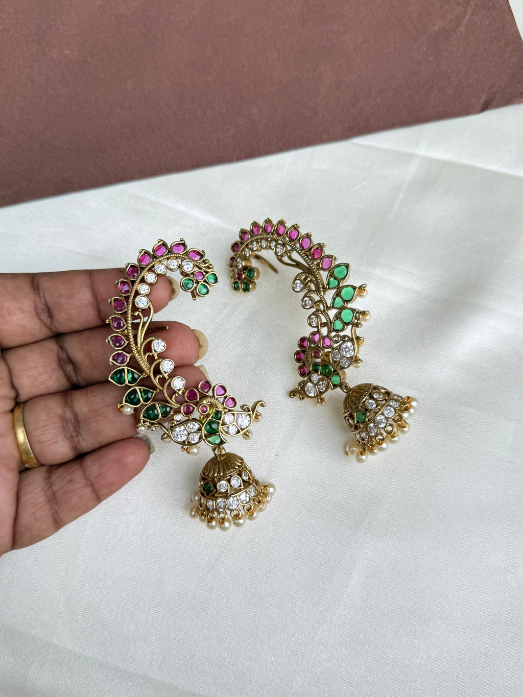 Er103 kemp peacock earcuffs