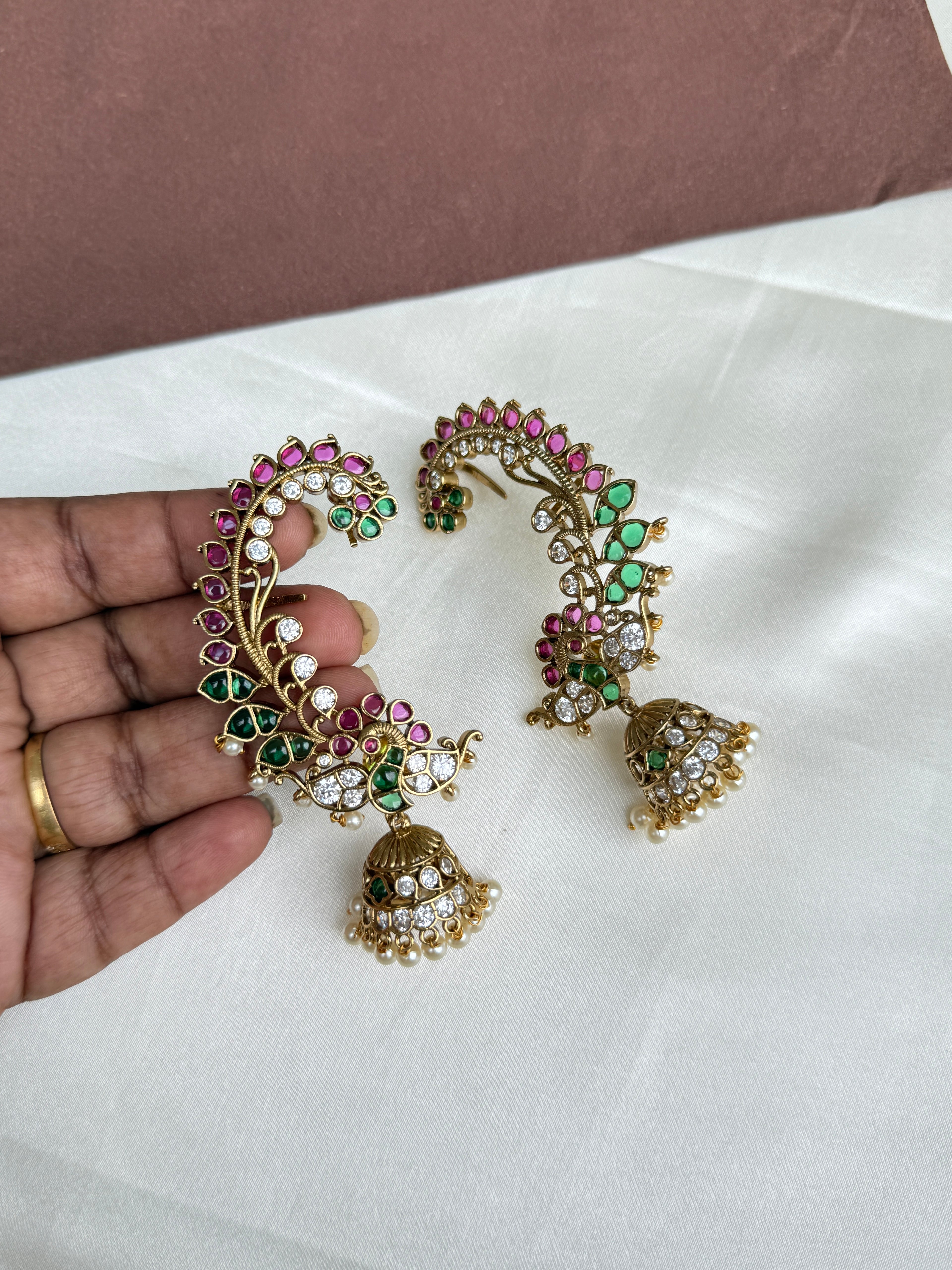 Er103 kemp peacock earcuffs