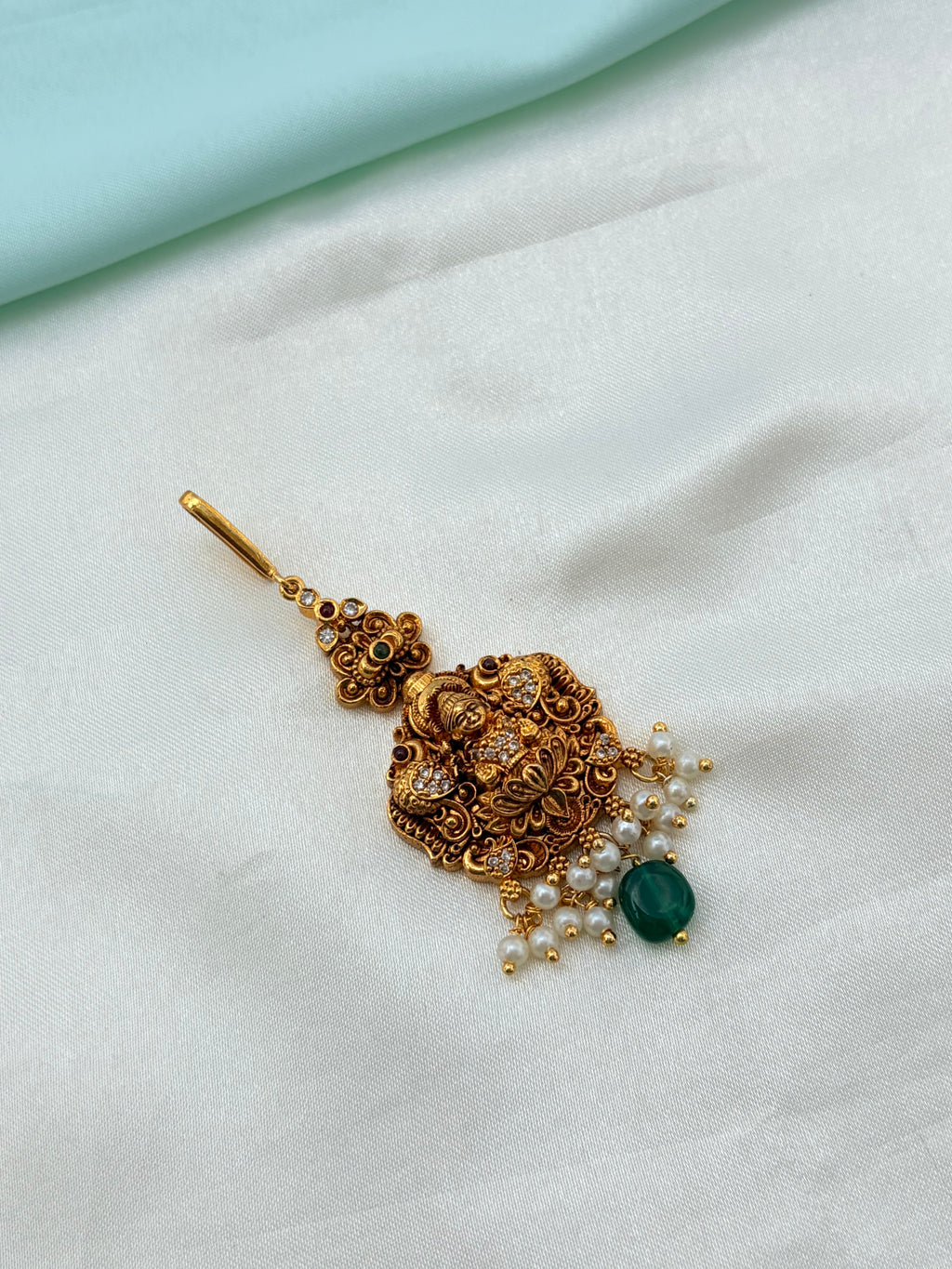 Lakshmi devi peacock design with pearls and bead tikka Tk900