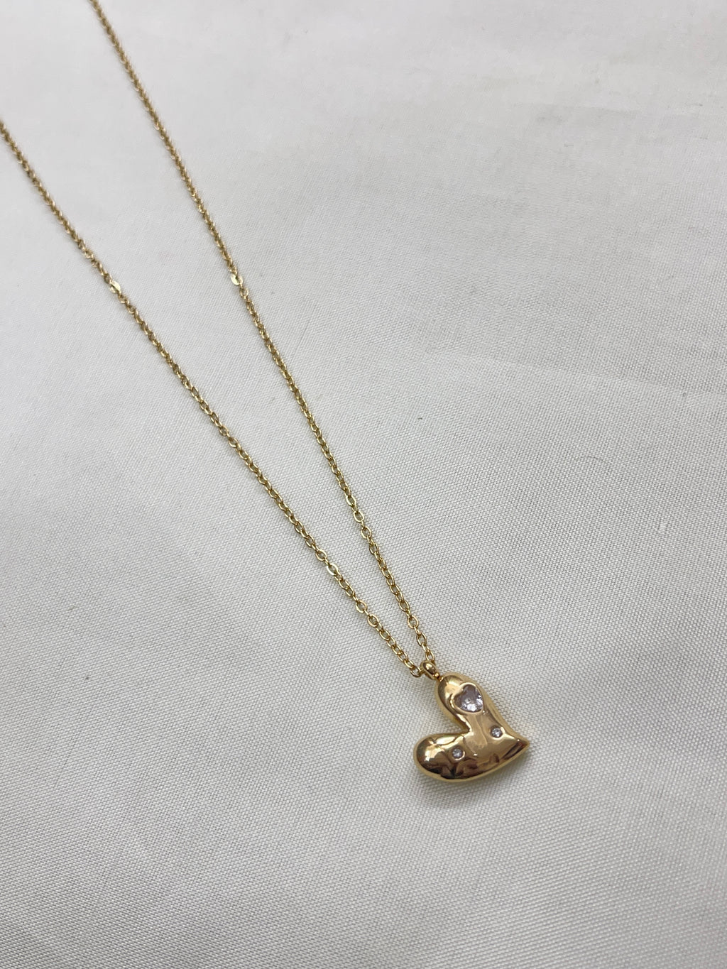 Hear pendant neckline