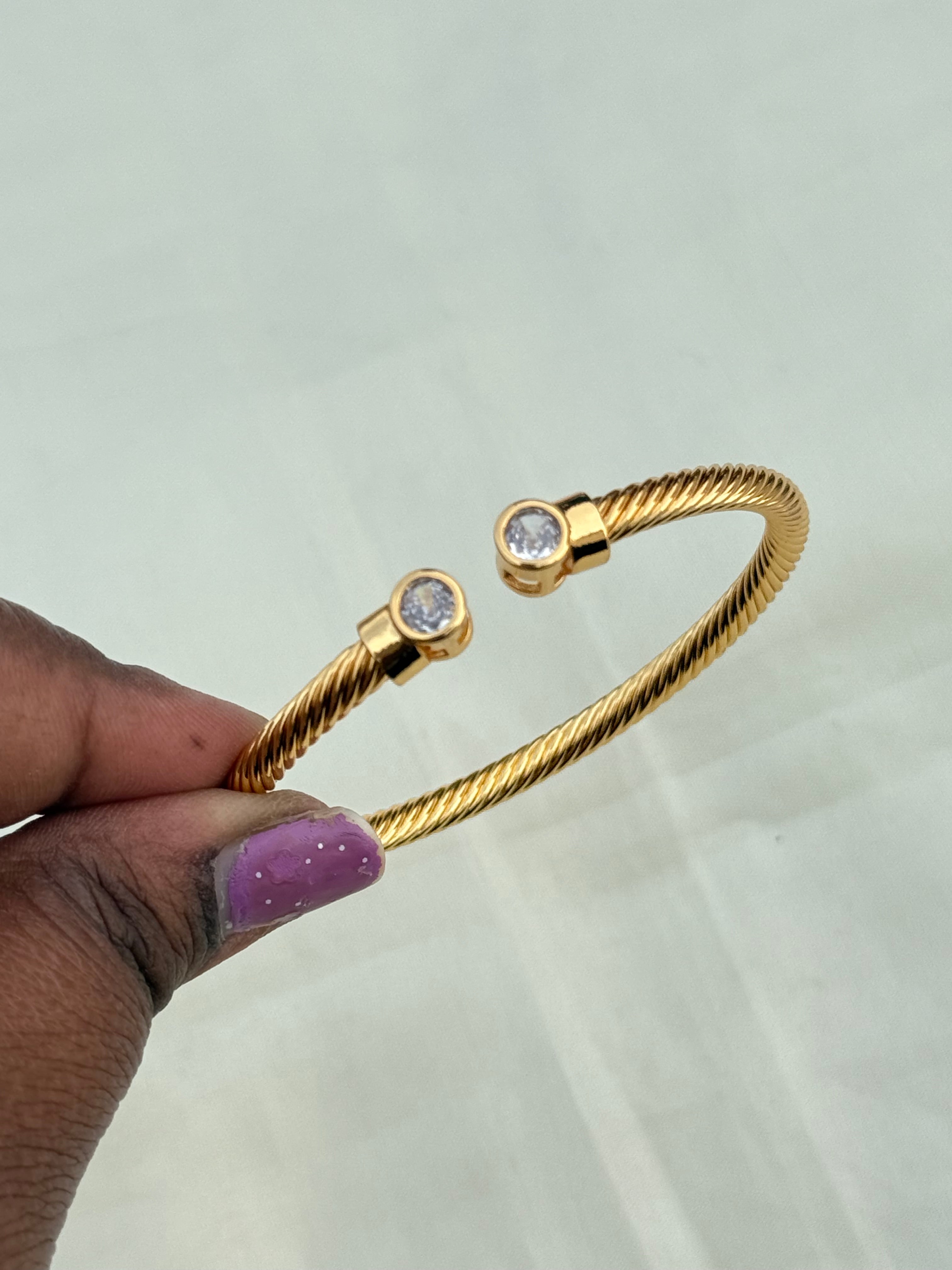 Ab008 white stone twist anti tarnish bracelet