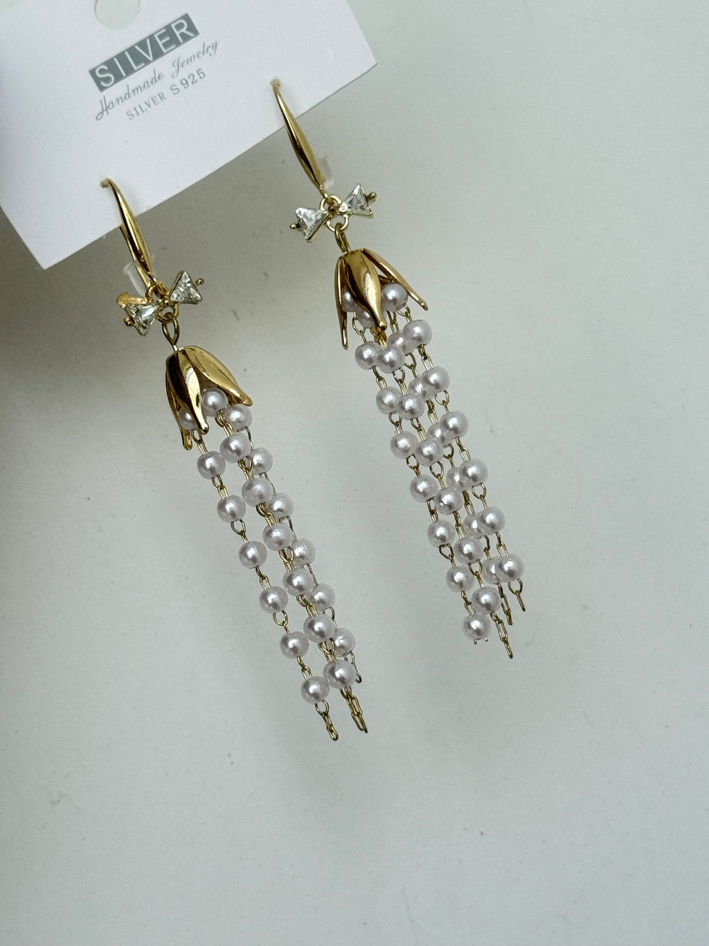 We506 pearl  tassels