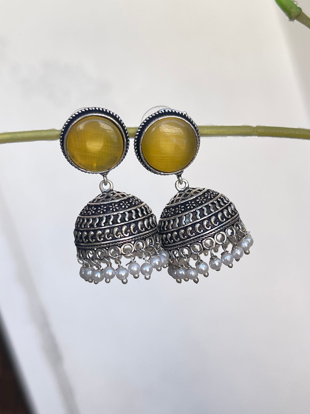 Lightweight oxidised butta earrings in orange and yellow