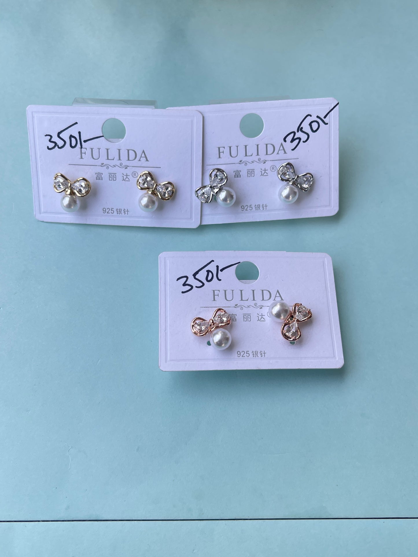 Bow pearl studs in 3 colors