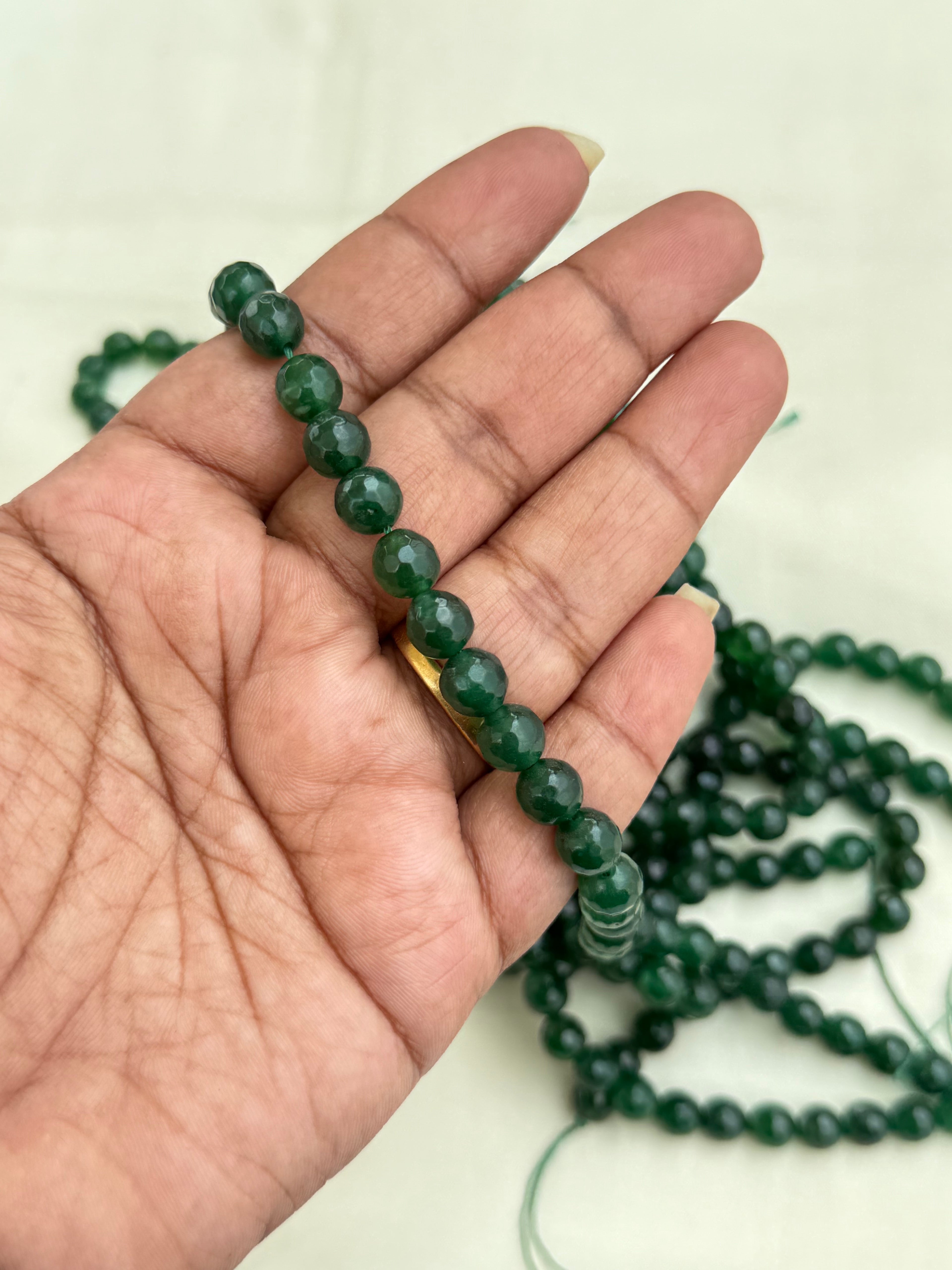 Rb001 onex beads in ruby and green..! Single line(250/-)