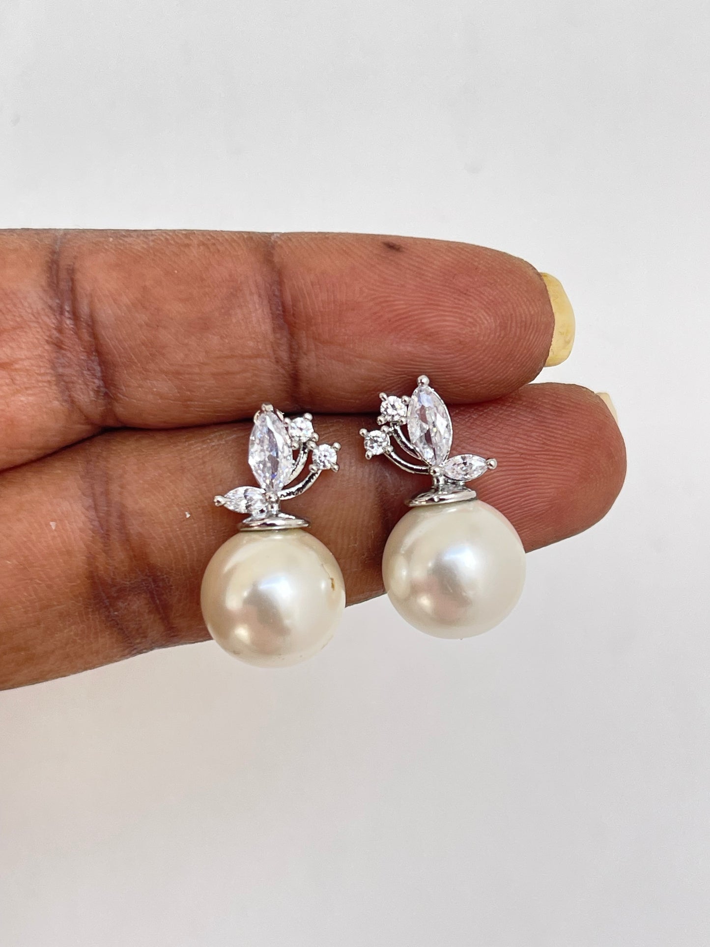 Silver pearl studs