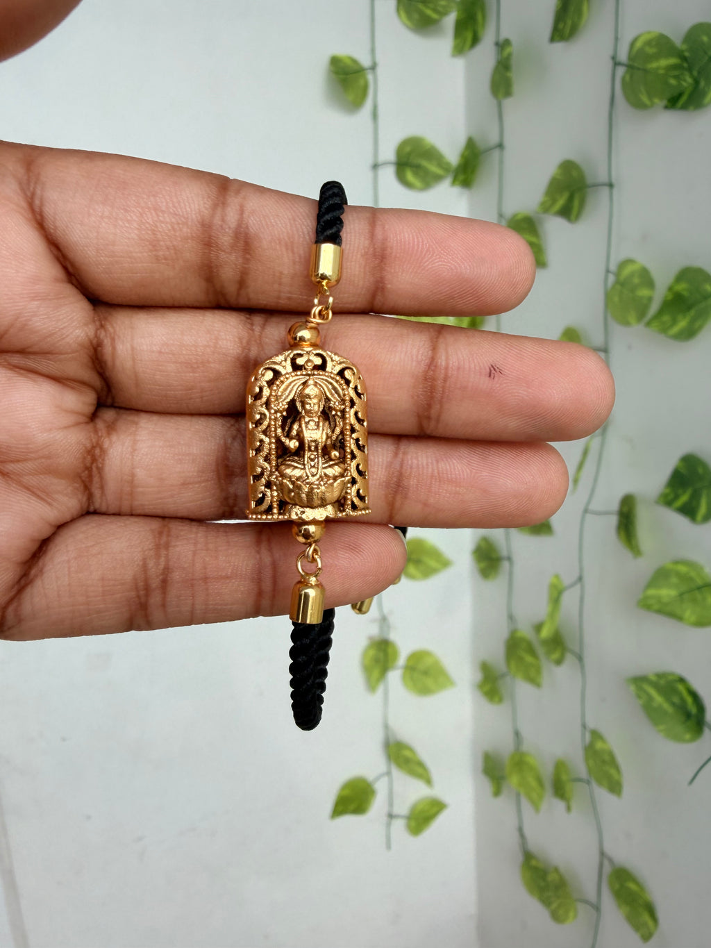Lakshmidevi black thread adjustable rakhi bracelet br580