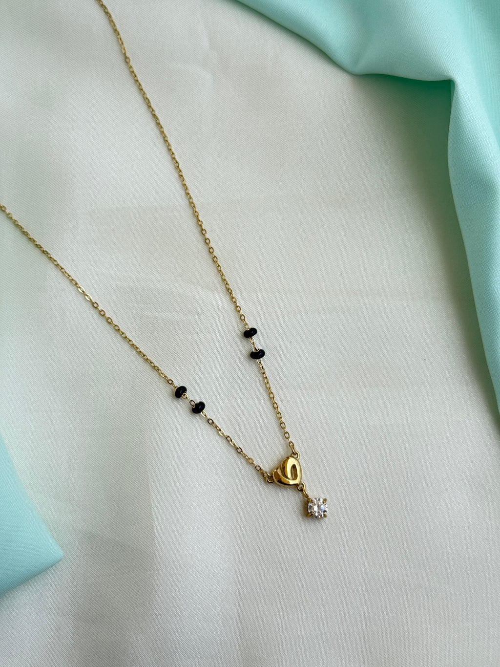 Bb130 anti tarnish gold heart stone 16 to 18 inches adjustable black beads