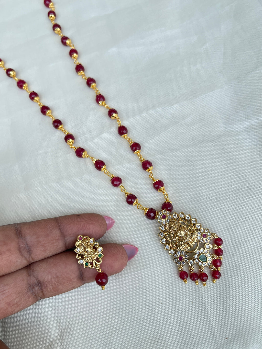 Green ruby Circle beads with kattu theega along with Lakshmi Devi pendant