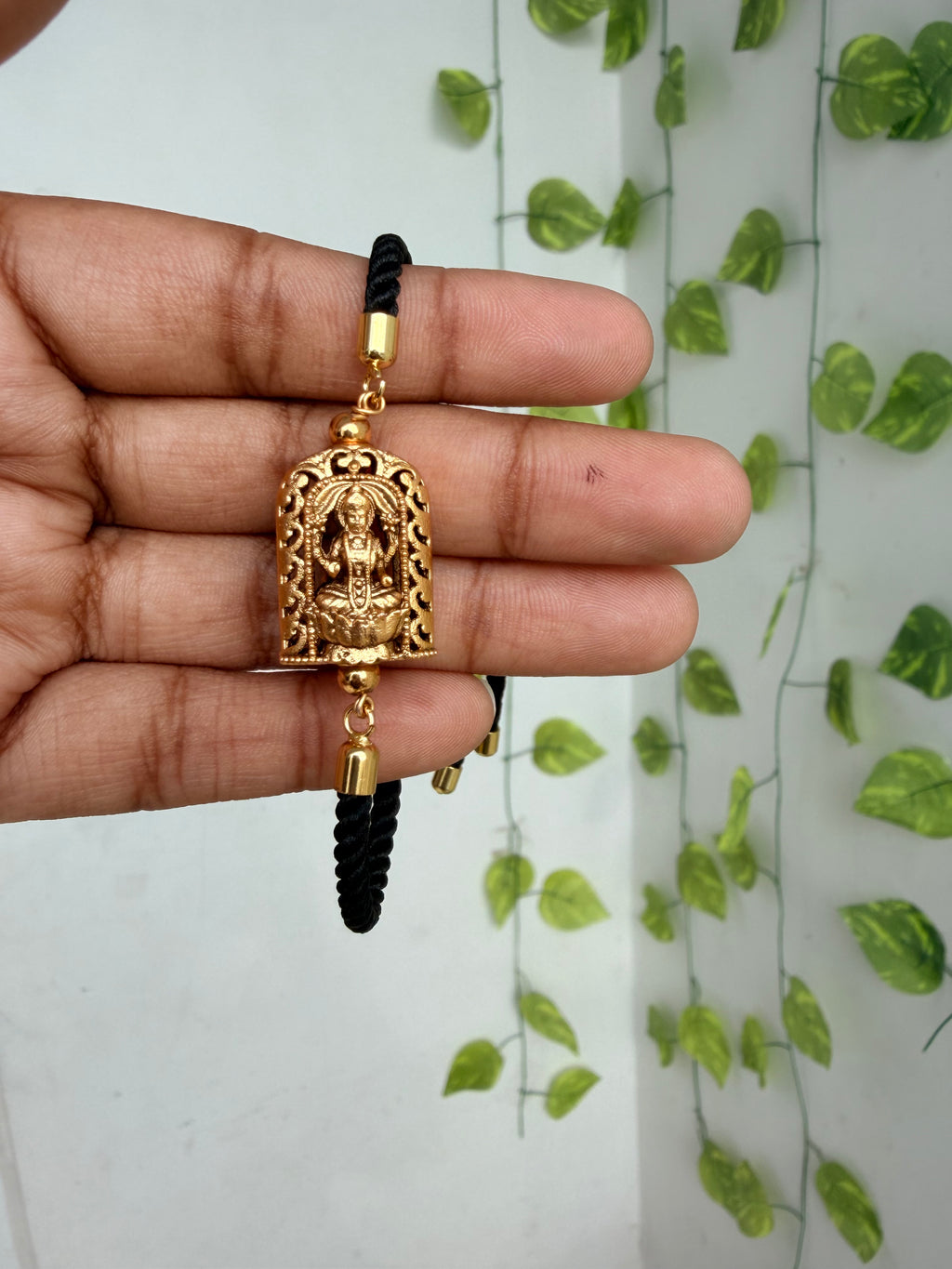 Lakshmidevi black thread adjustable rakhi bracelet br580