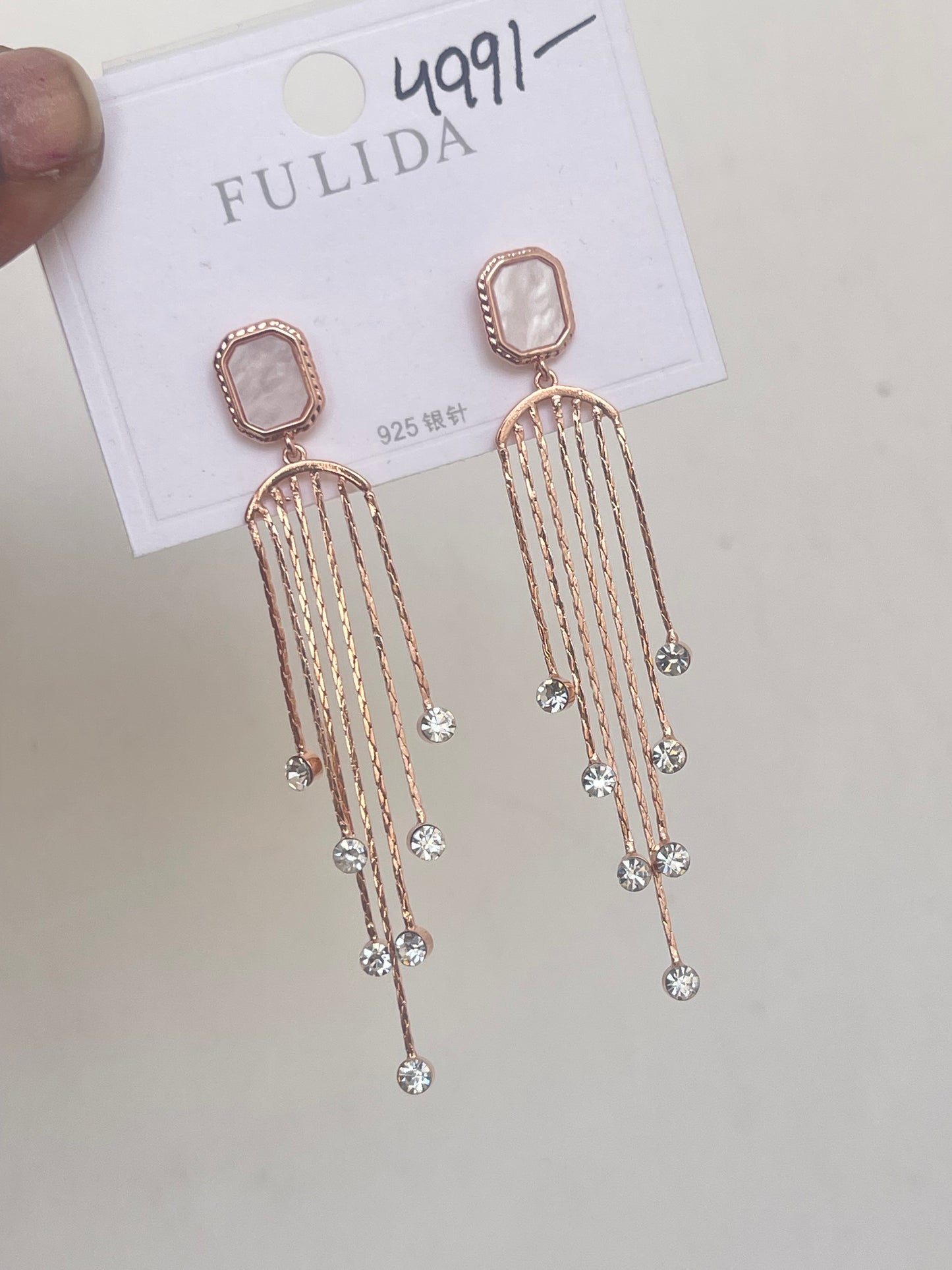 Square hanging tassels in gold and rosegold