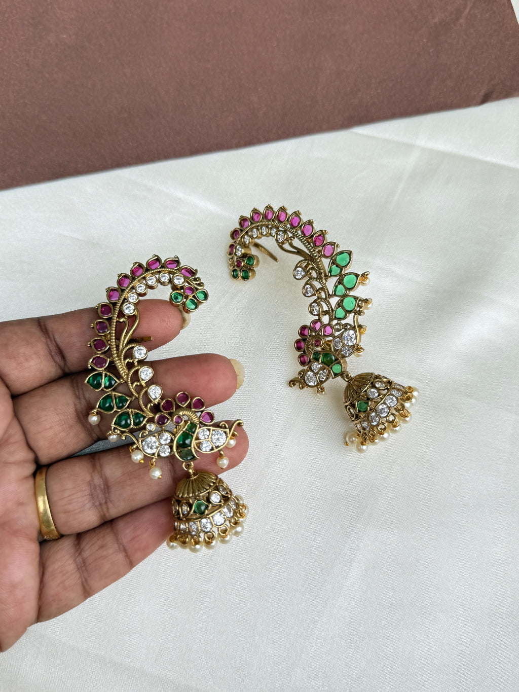 Er103 kemp peacock earcuffs