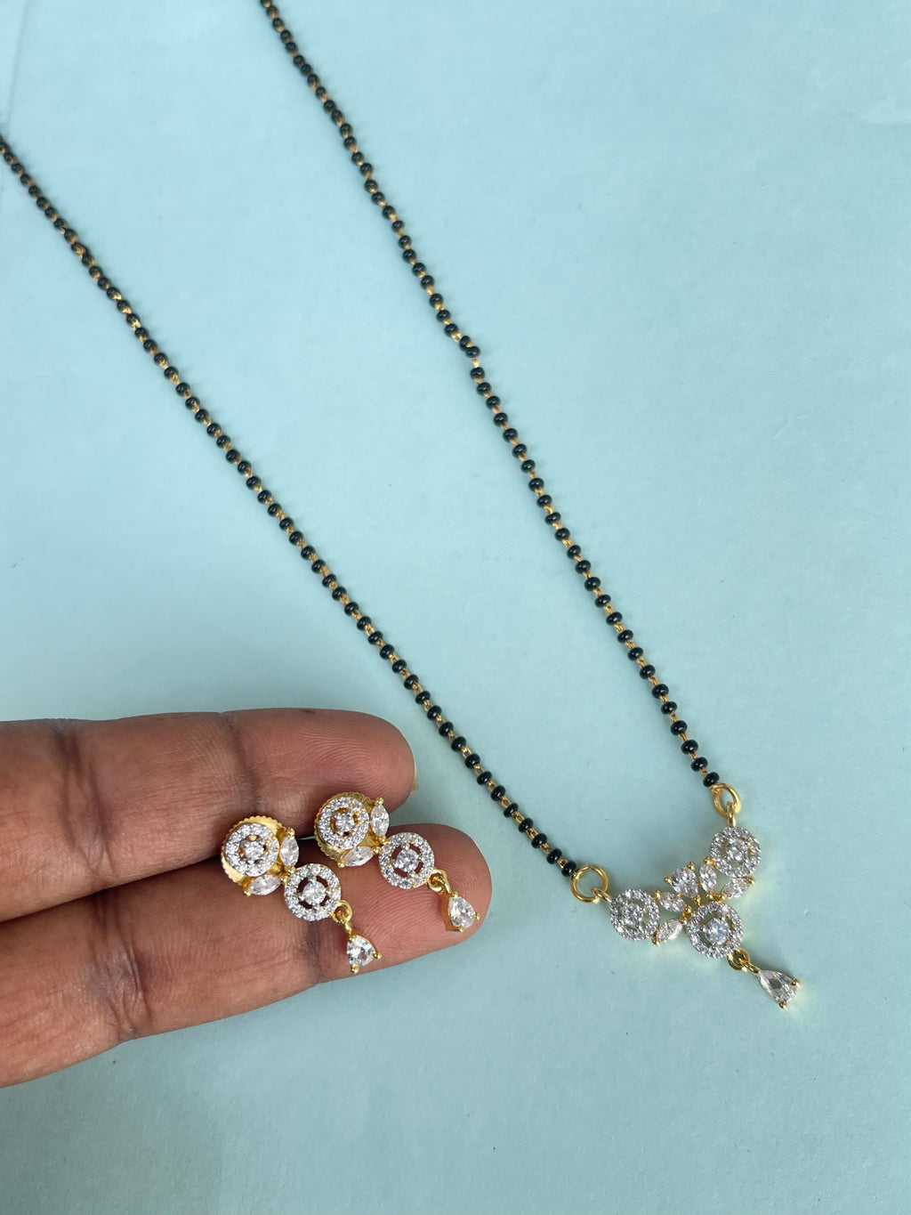 Diamond finish pendant with earrings single line 18 inches blackbeads