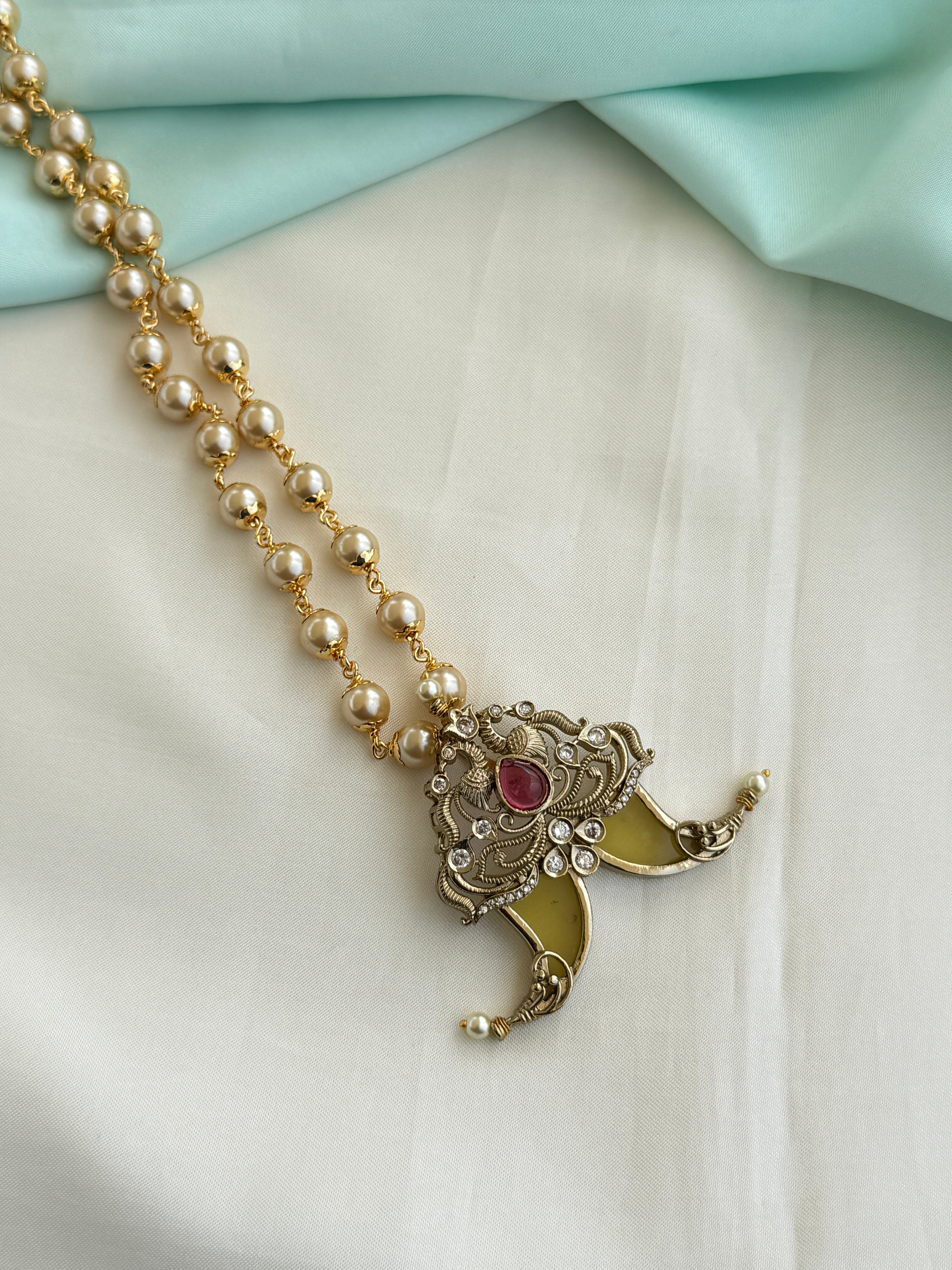 Pg016 Puligoru pendant with 24 inches pearl chain