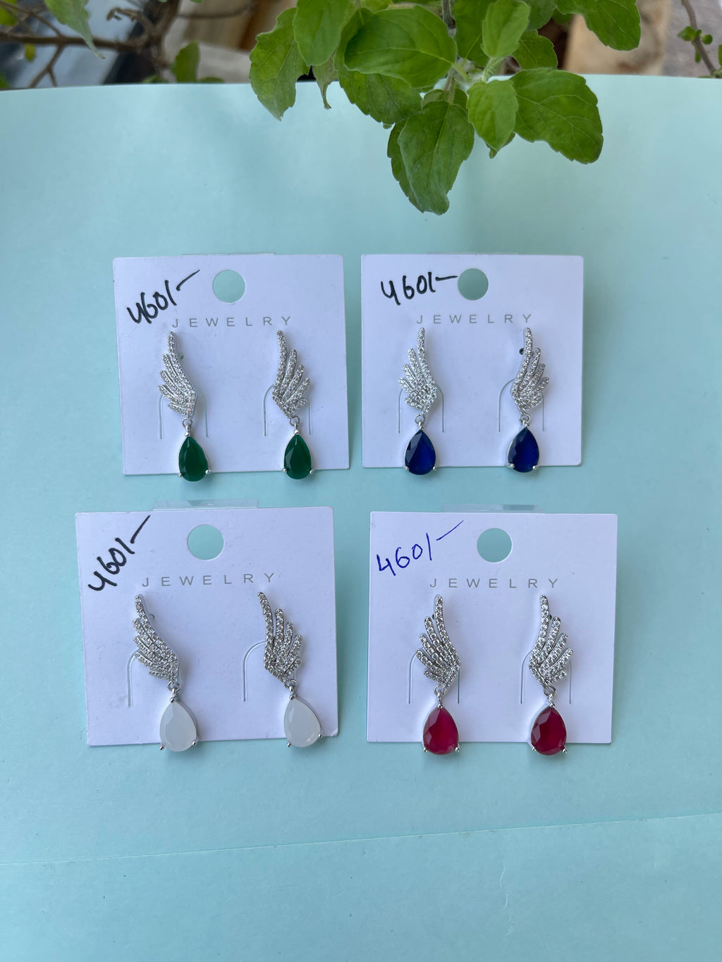Silver earrings with stone hanging