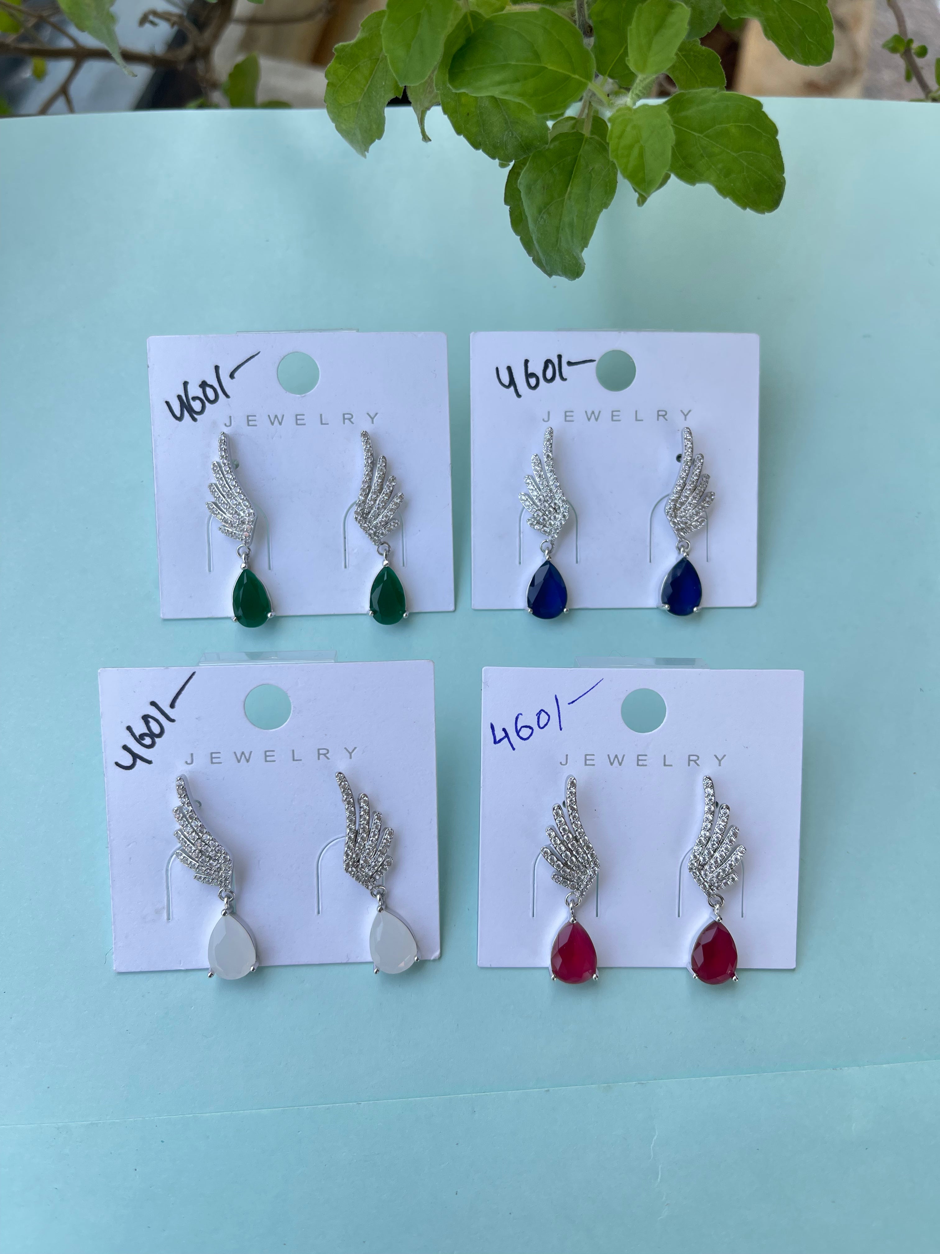Silver earrings with stone hanging
