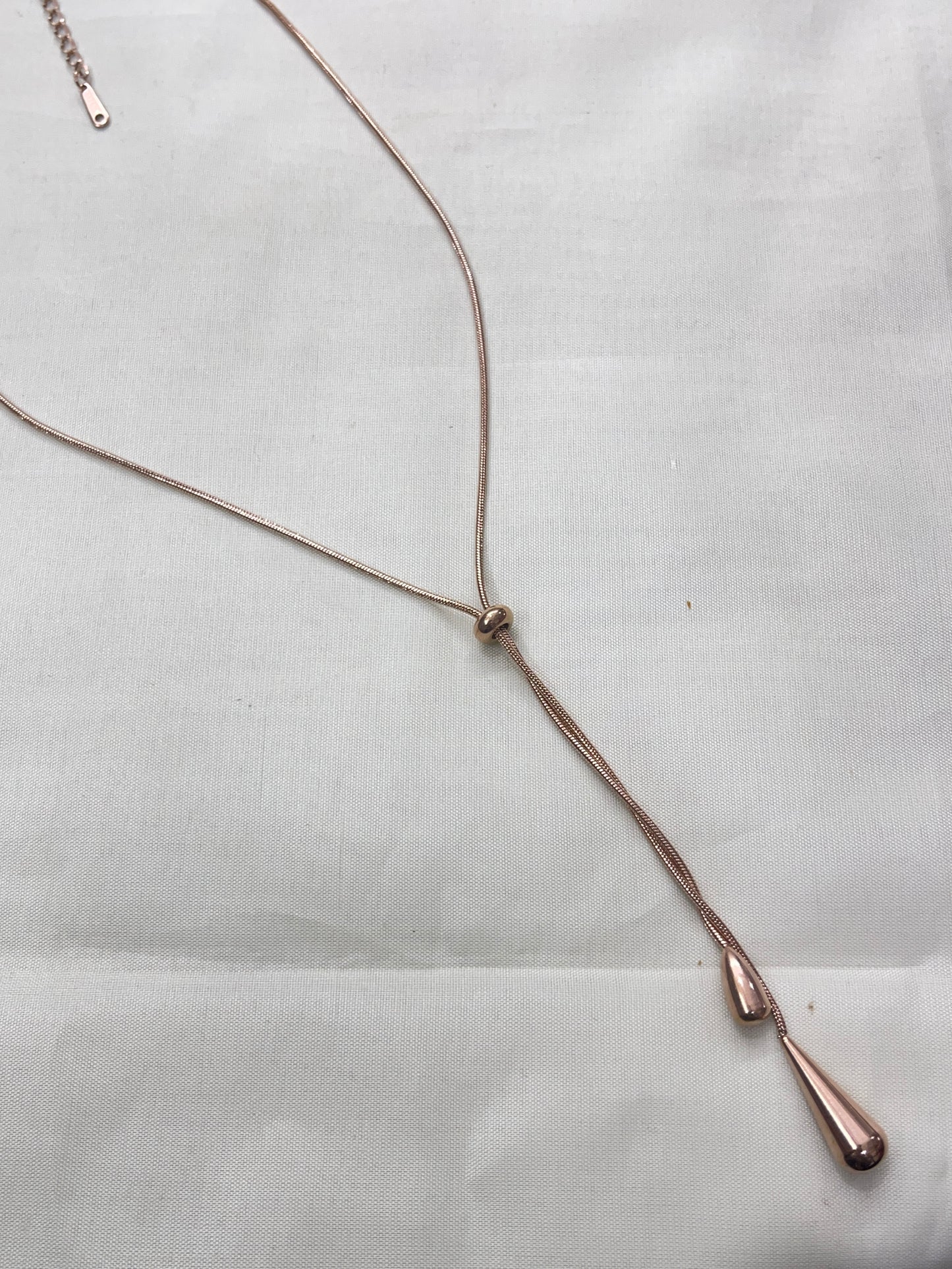 Adjustable rose gold drop neckline