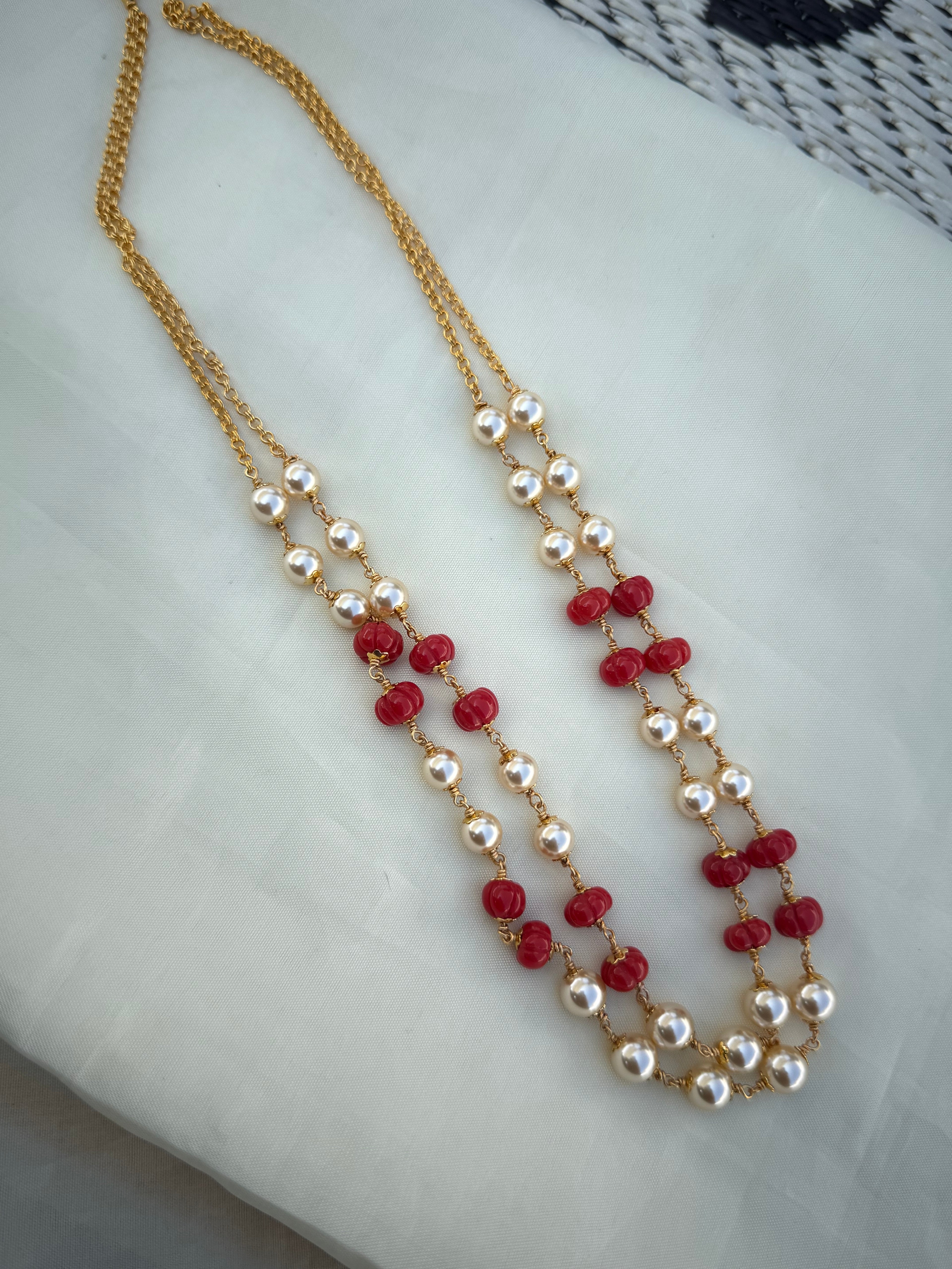 Bb229 2 lines pumpkin coral beads