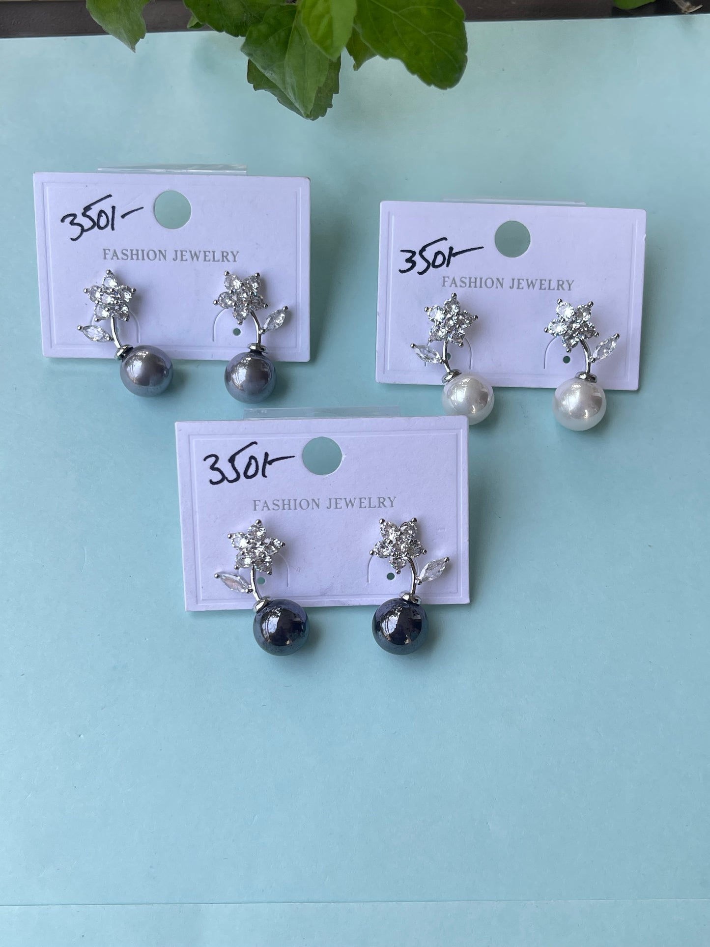 Flower stem pearl hanging studs