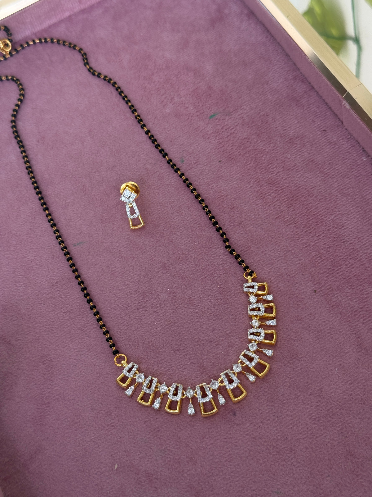 Single line diamond finish pendant with studs 20 inches black beads bb336