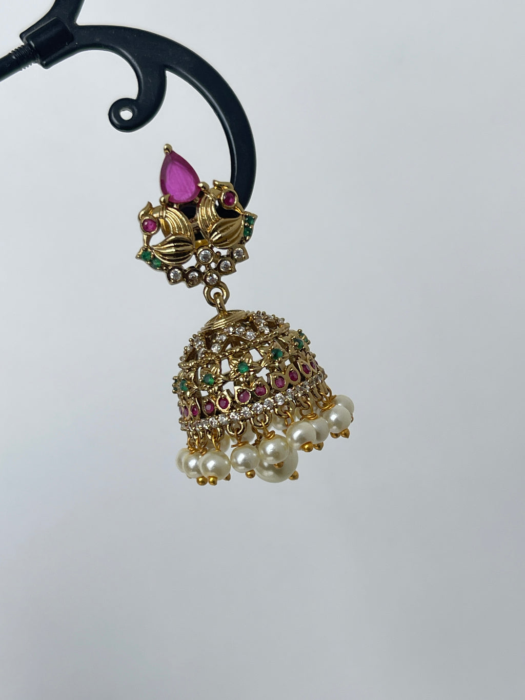 Dual peacock butta earrings