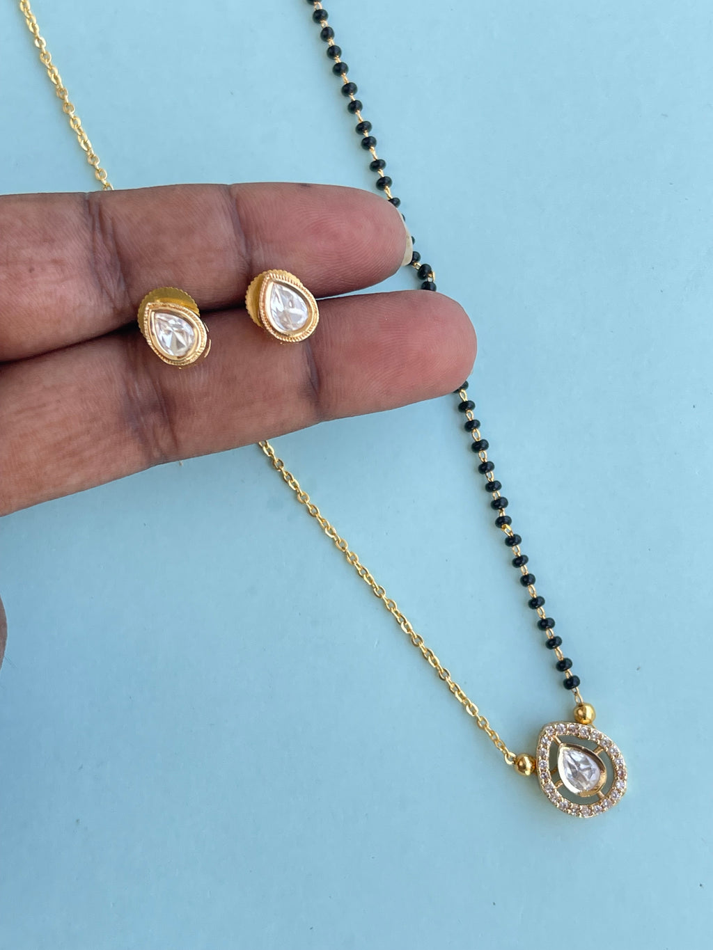 Simple Kundan pendent with Earrings blackbeads (mangalsutra)