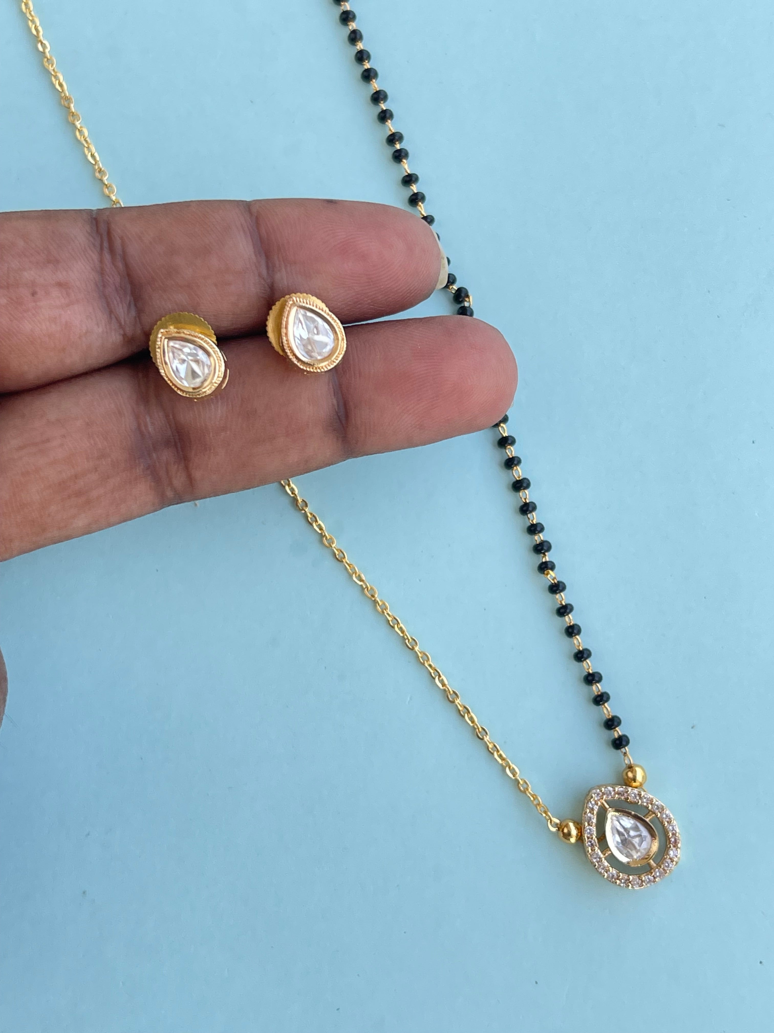 Simple Kundan pendent with Earrings blackbeads (mangalsutra)