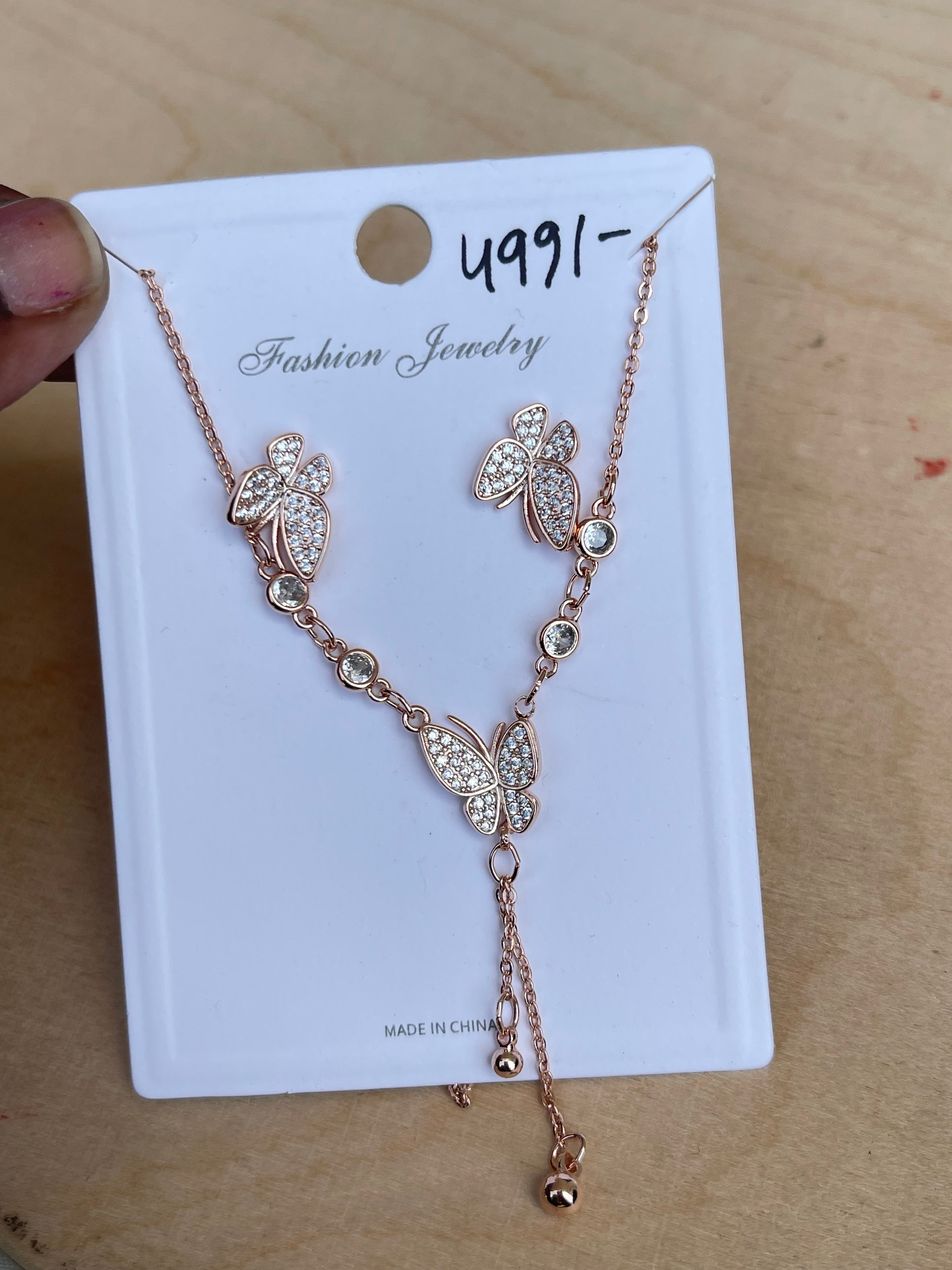 Butterfly dailywear chain with studs in gold and rose gold dc509