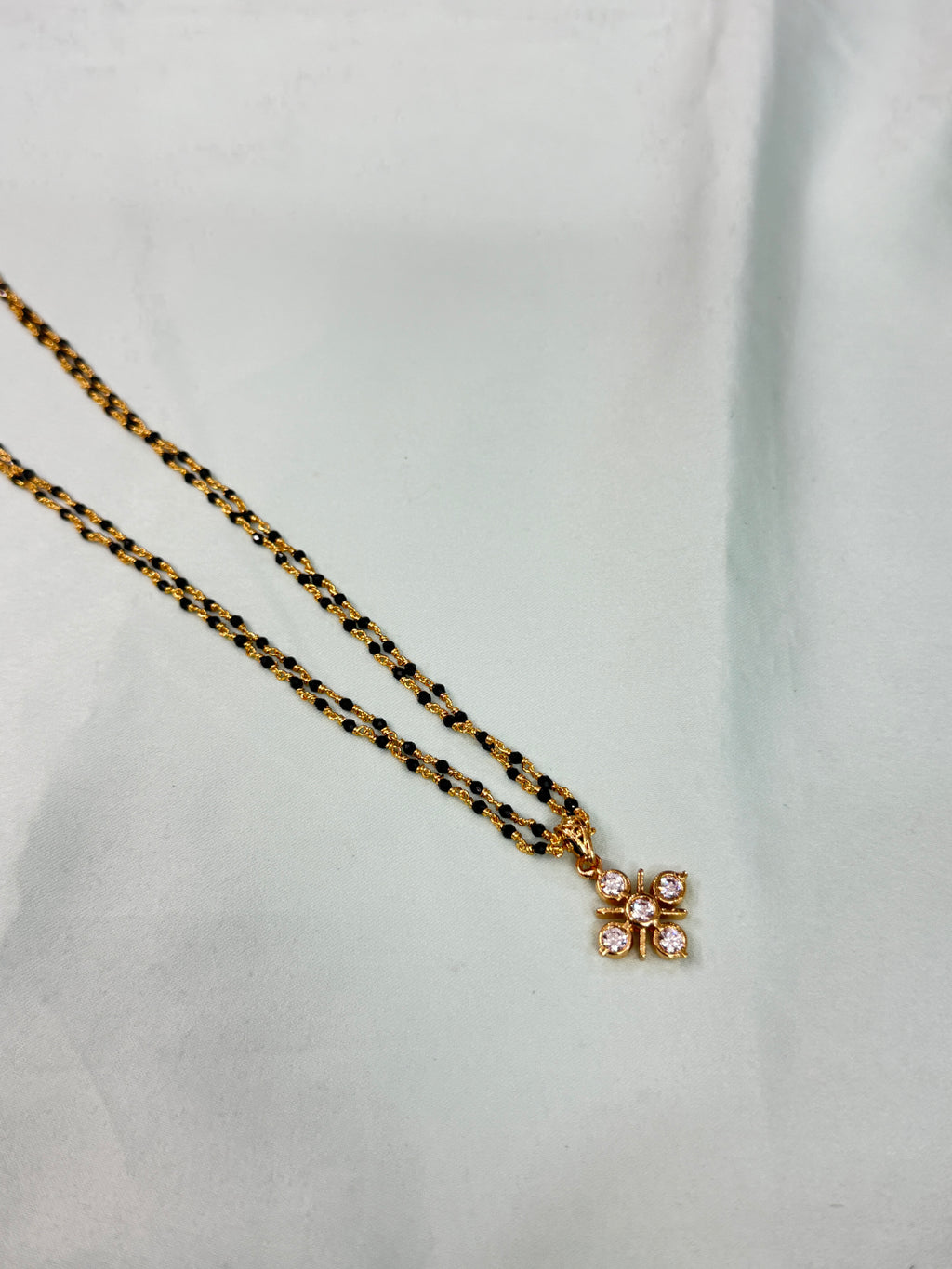Bb222 micro gold 2 layers black bead with Panchaloham pendant 18 inches black beads