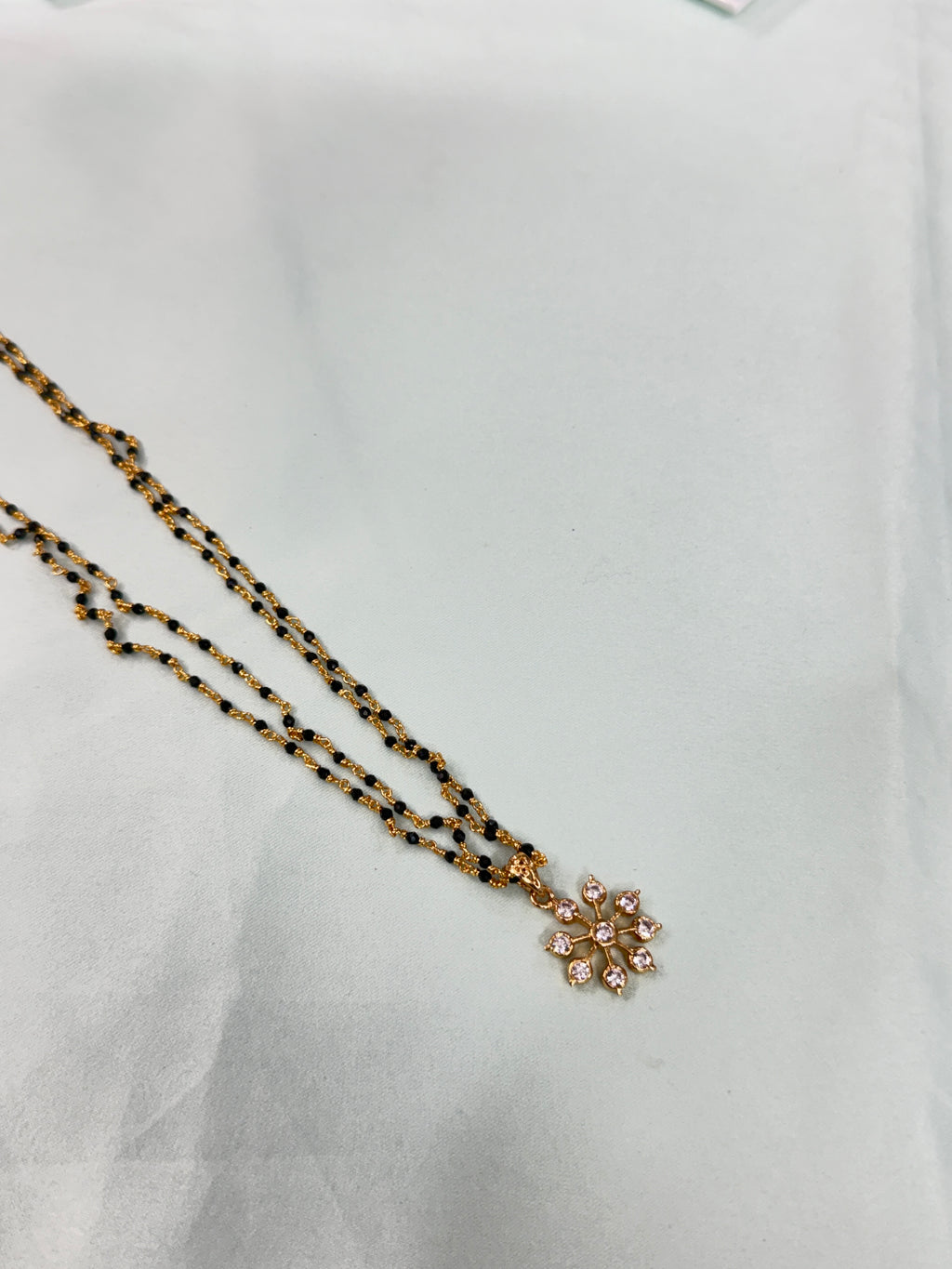 Bb220 micro gold 2 layers black bead with Panchaloham pendant 18 inches black beads
