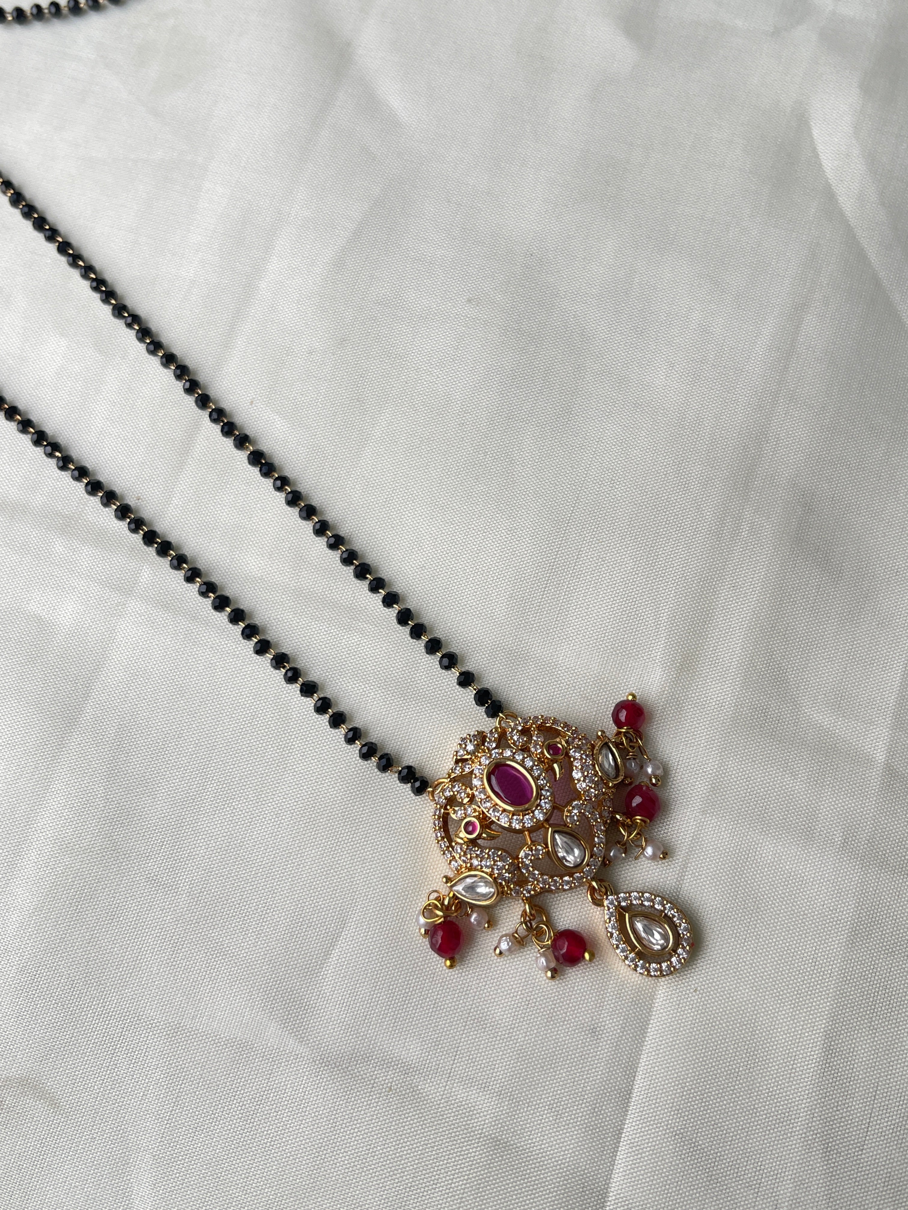 Dual peacock moissanite single line blackbeads