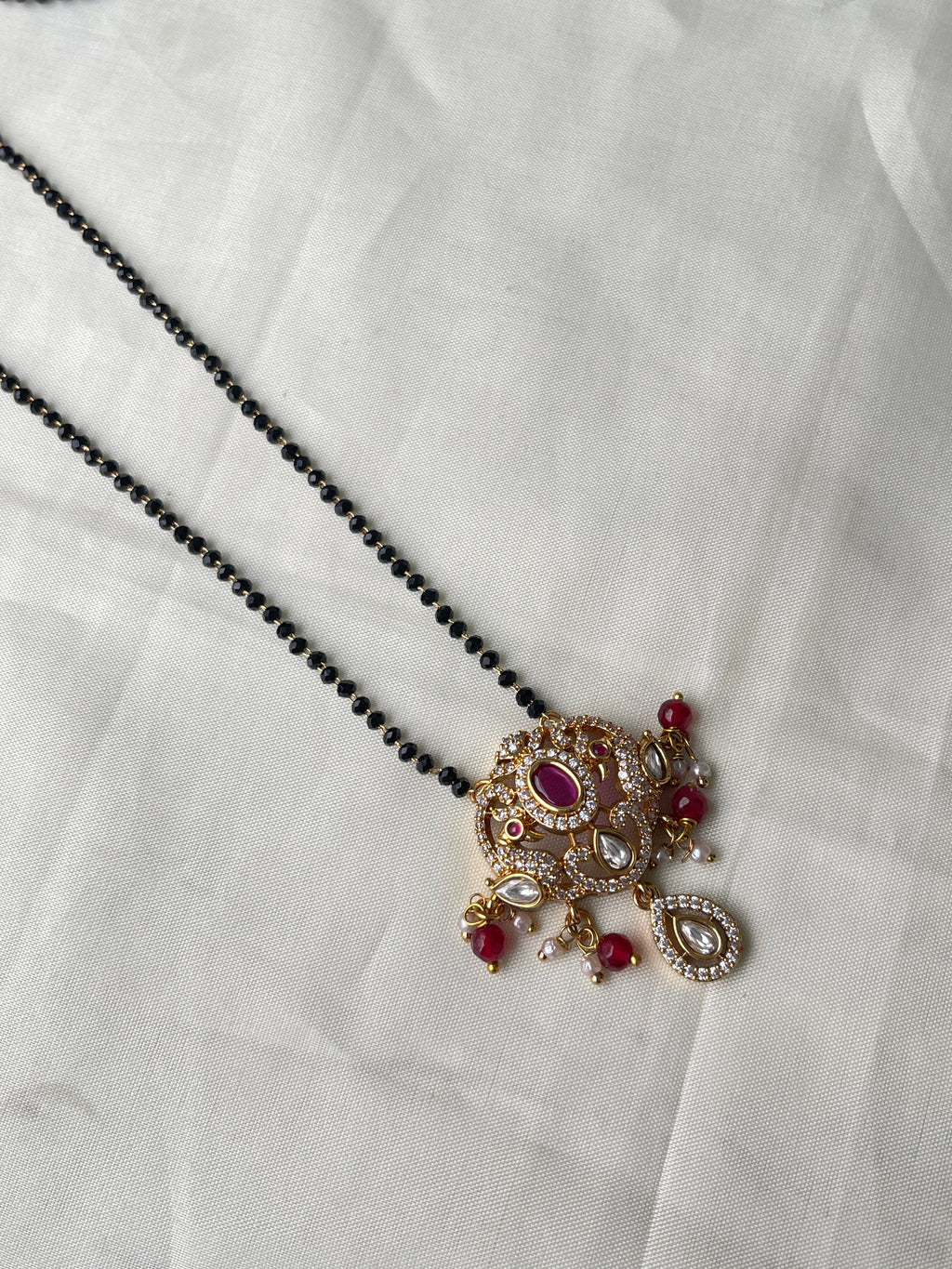 Single line short blackbeads with Moissanite pendant