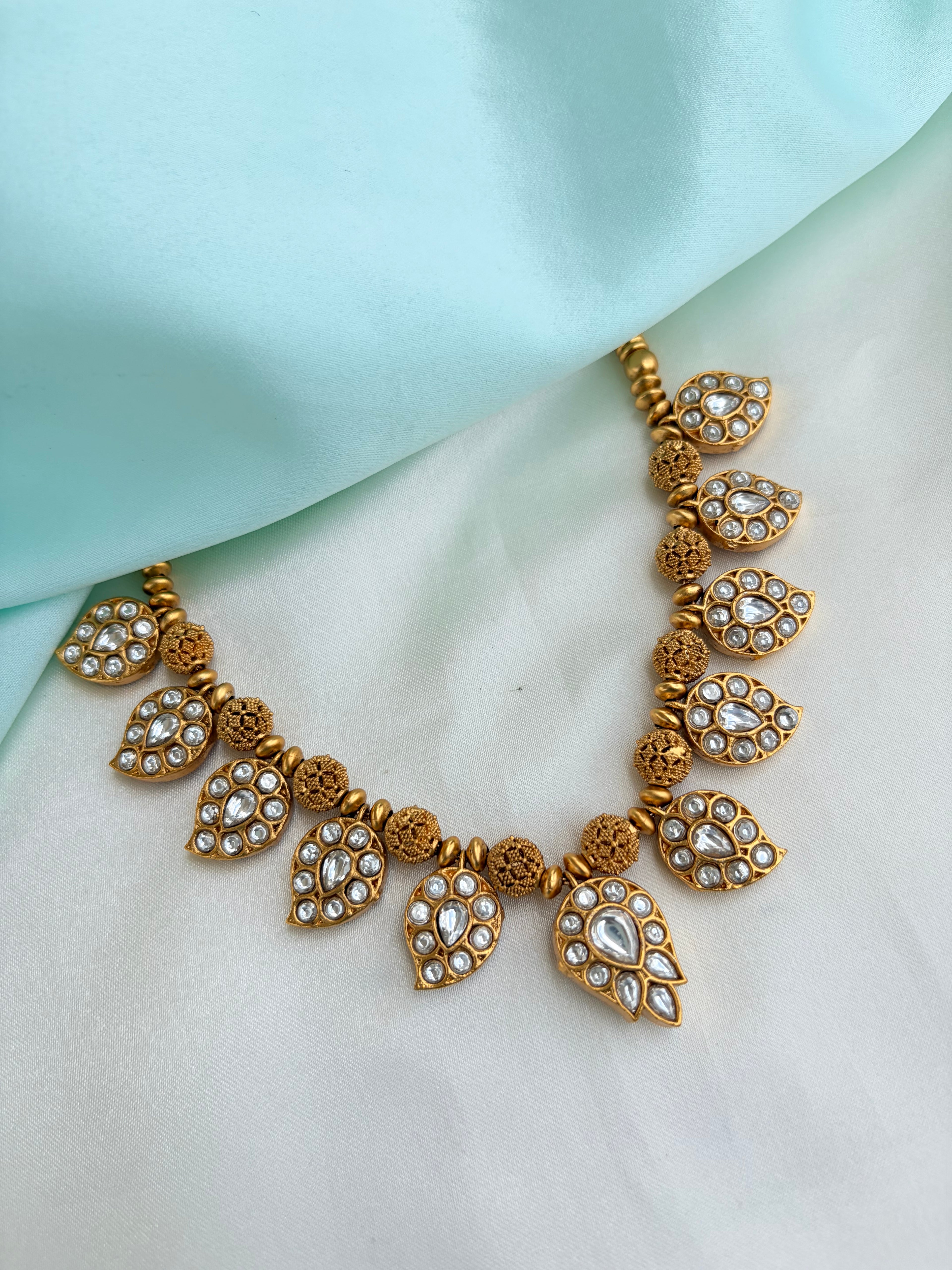 2-in-1 Dual-Sided antique gold Mango motif neckset with Ruby, Emerald, and kundan Stones Ns946