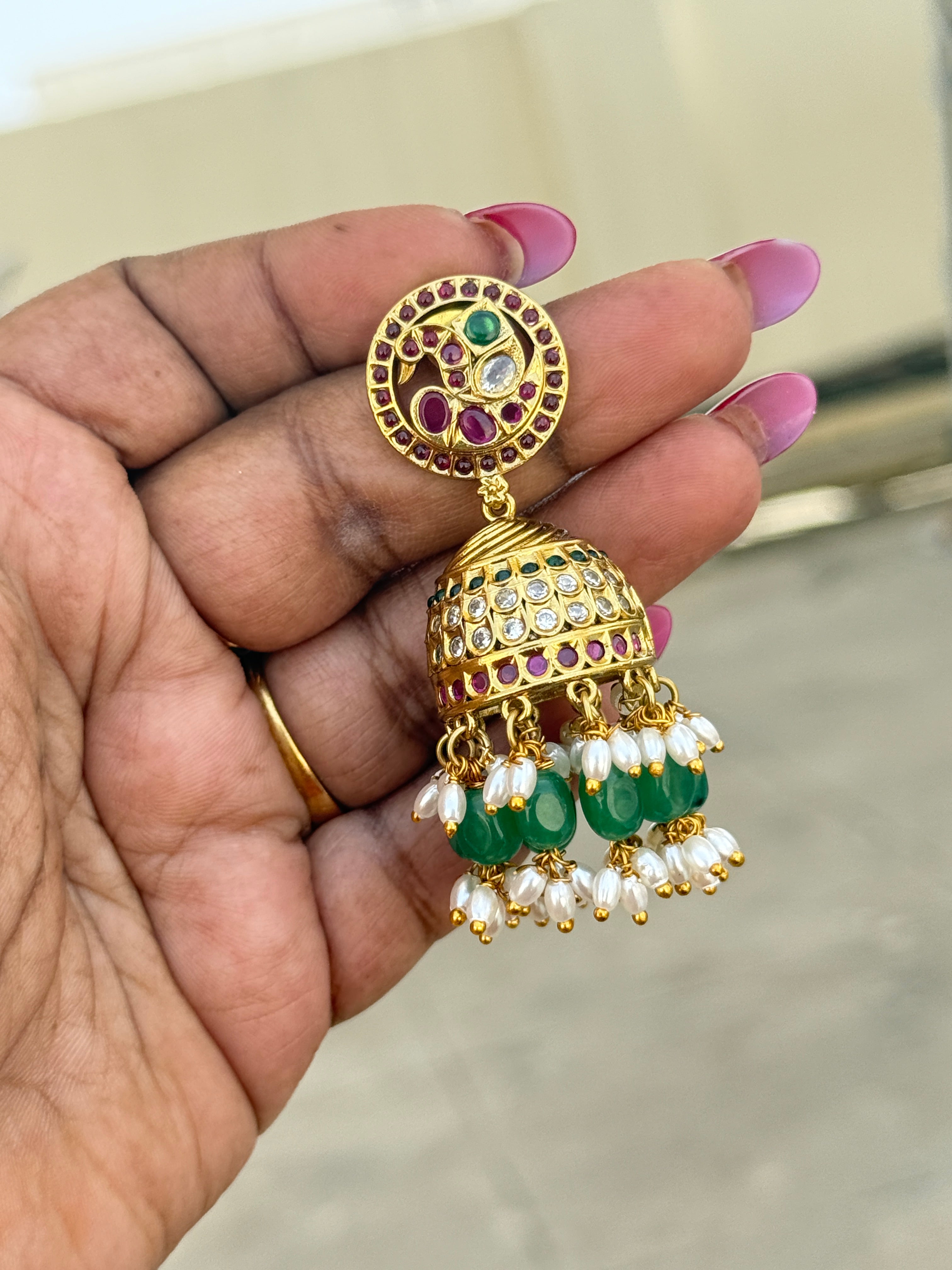 Er260 kemp peacock butta earrings with rice pearls