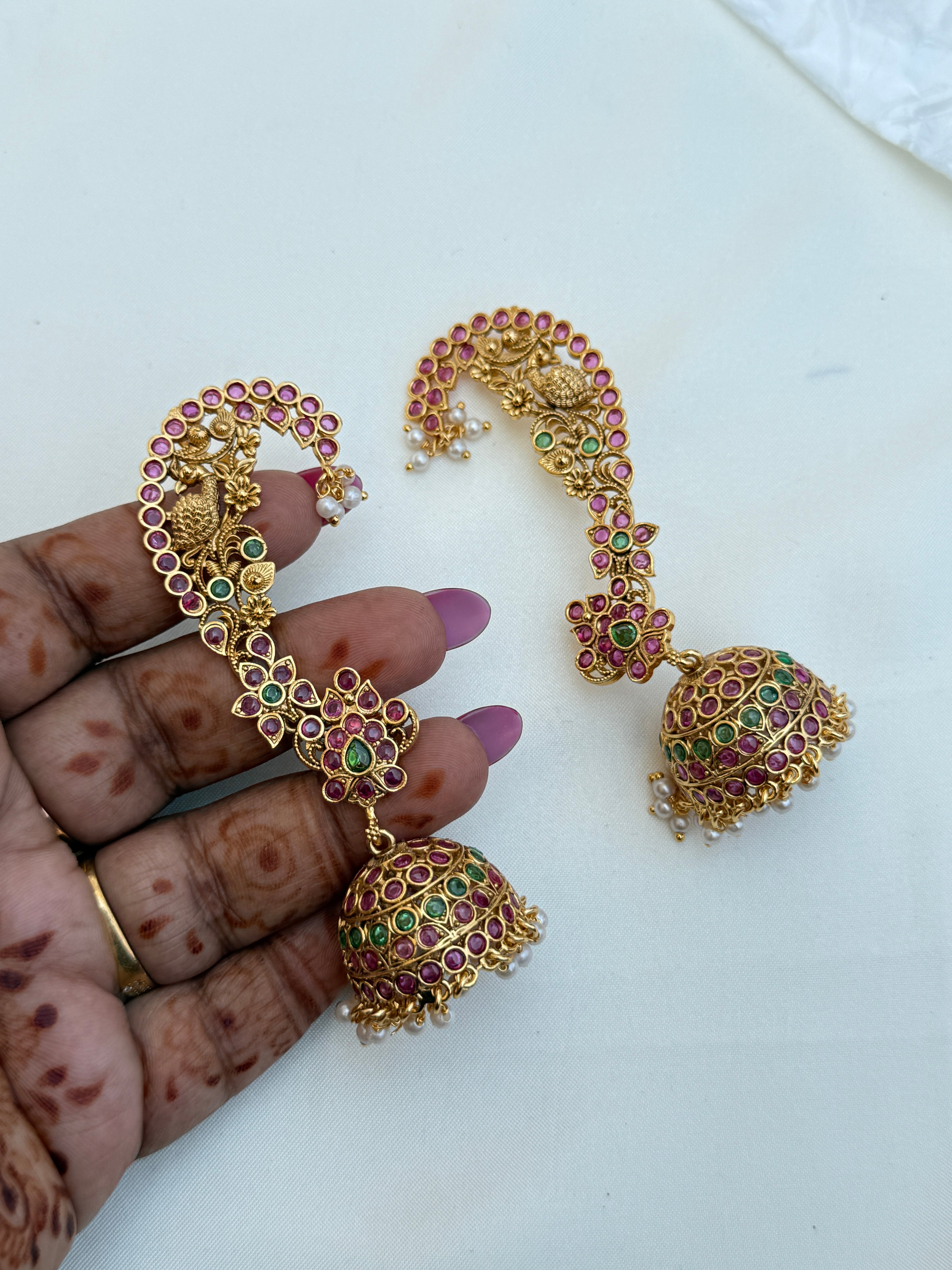 Er231 kemp peacock butta earcuffs