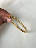 10 stone square gold bracelet